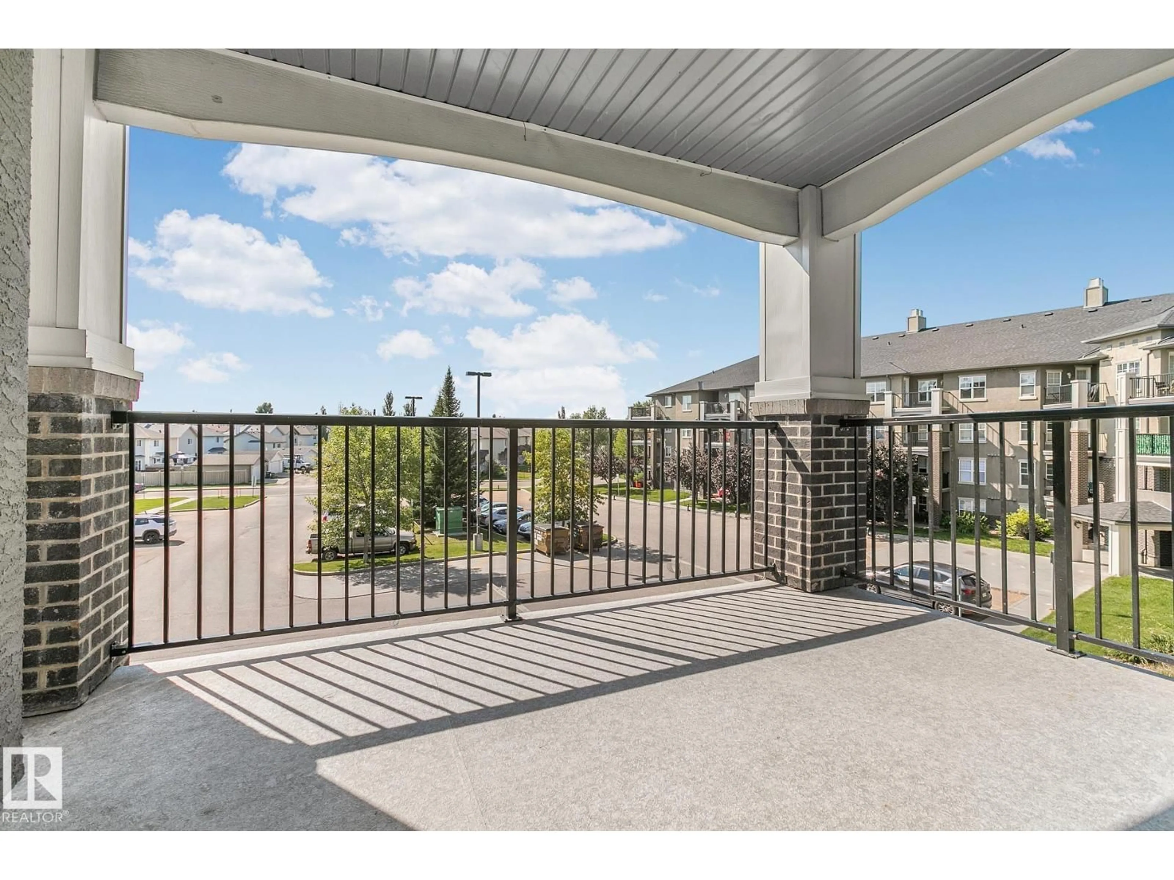Patio, water/lake/river/ocean view for 301 - 630 MCALLISTER LO, Edmonton Alberta T6W1N3