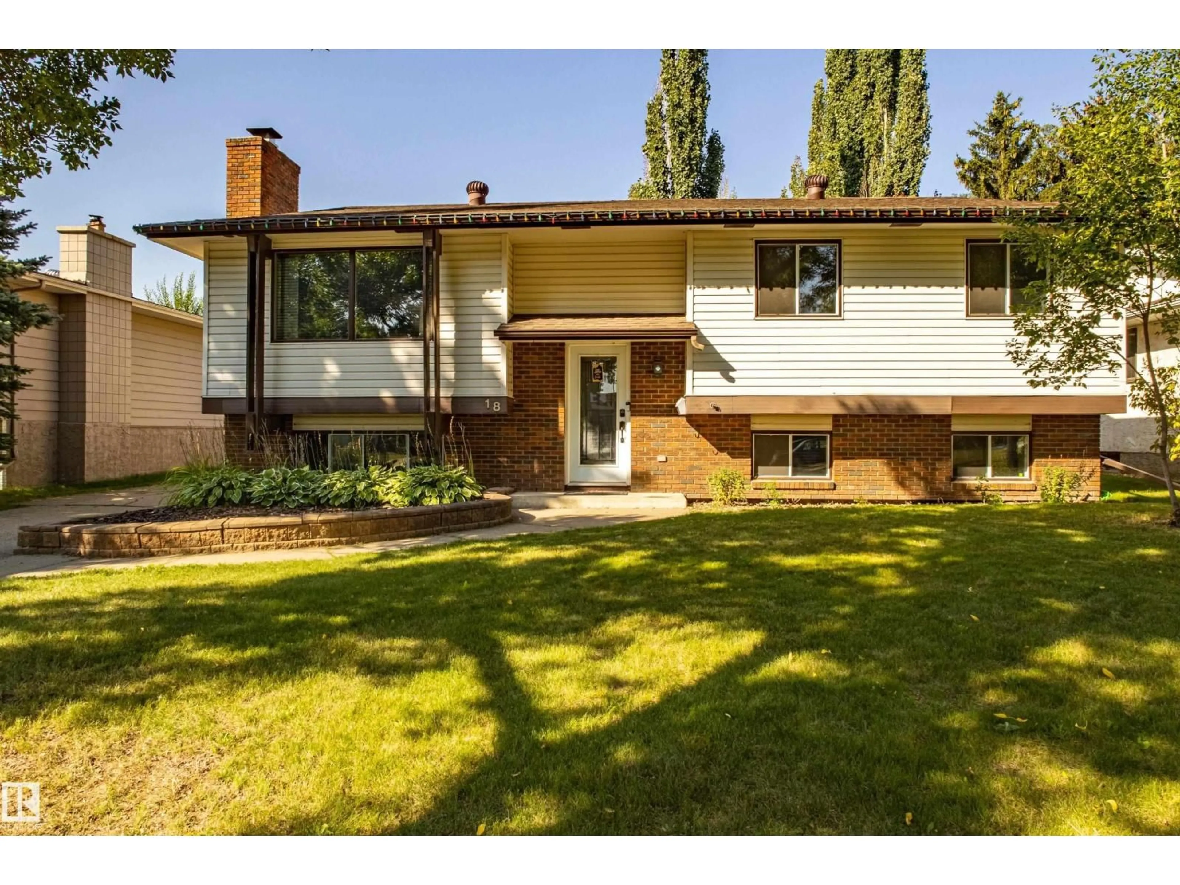 Home with brick exterior material, street for 18 LOCKHART DR, St. Albert Alberta T8N2V1