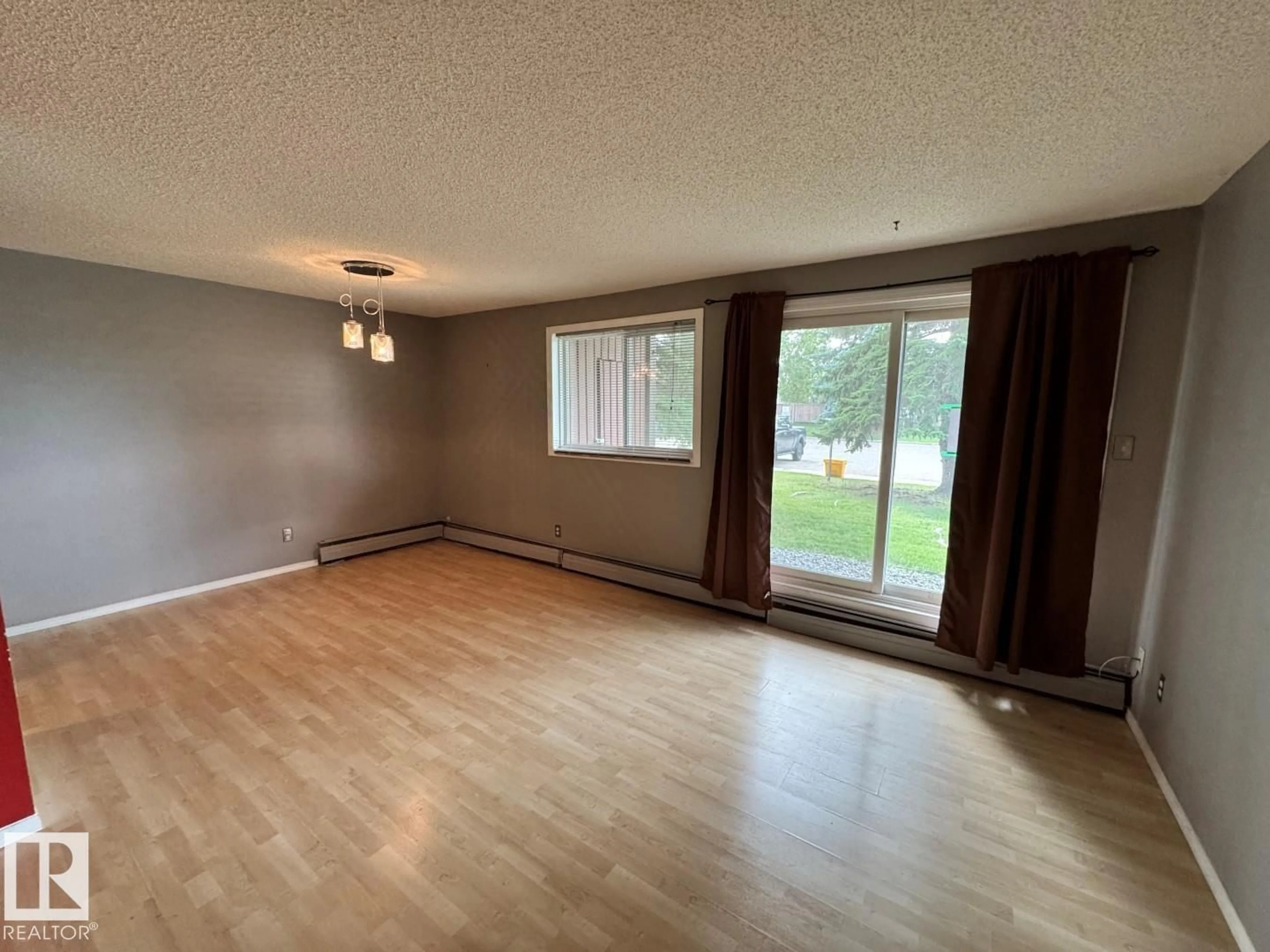 A pic of a room for #101 - 2303 119 ST, Edmonton Alberta T6J4E2