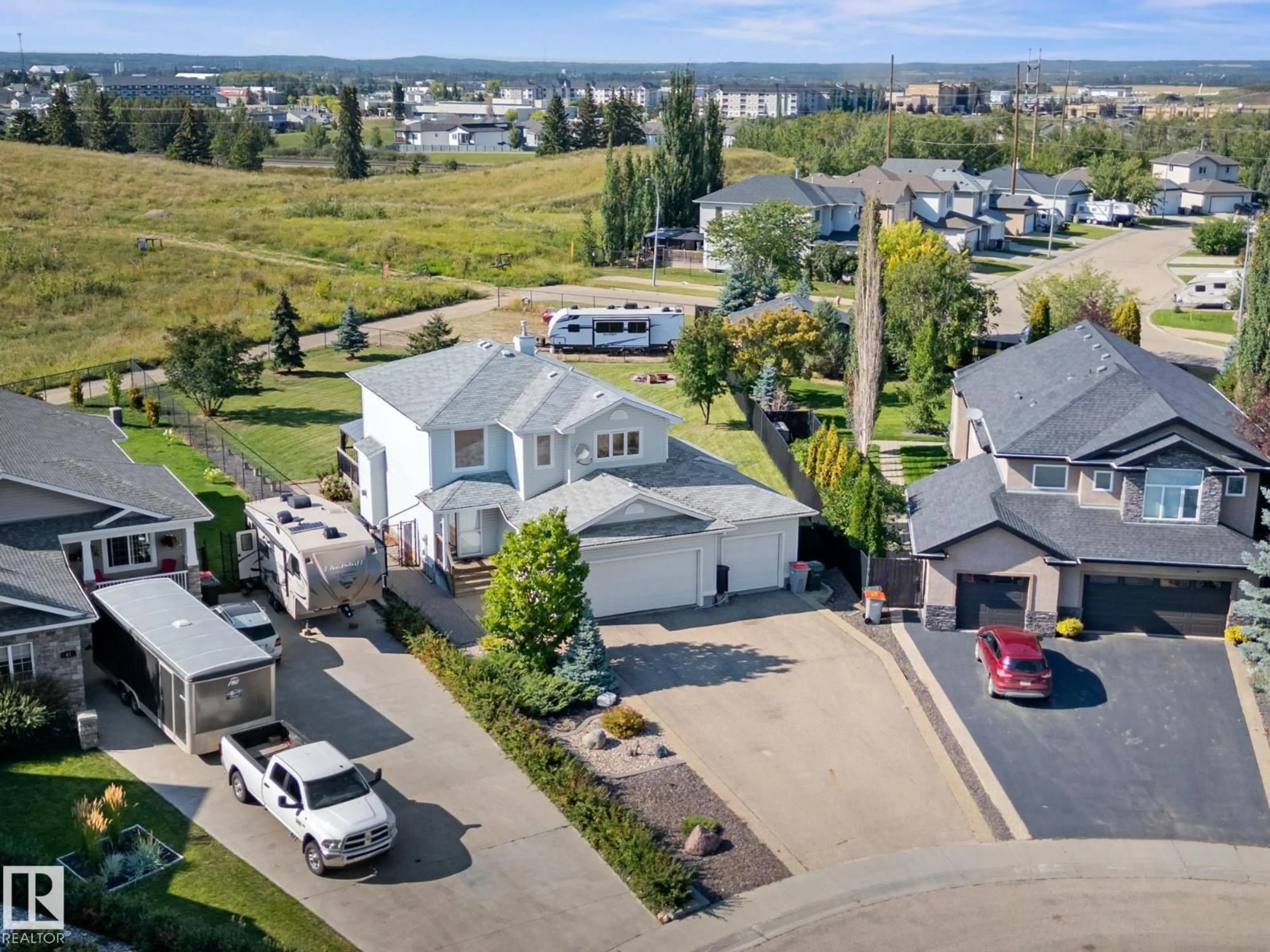 A pic from outside/outdoor area/front of a property/back of a property/a pic from drone, street for 69 BRIARWOOD PT, Stony Plain Alberta T7Z2Z2