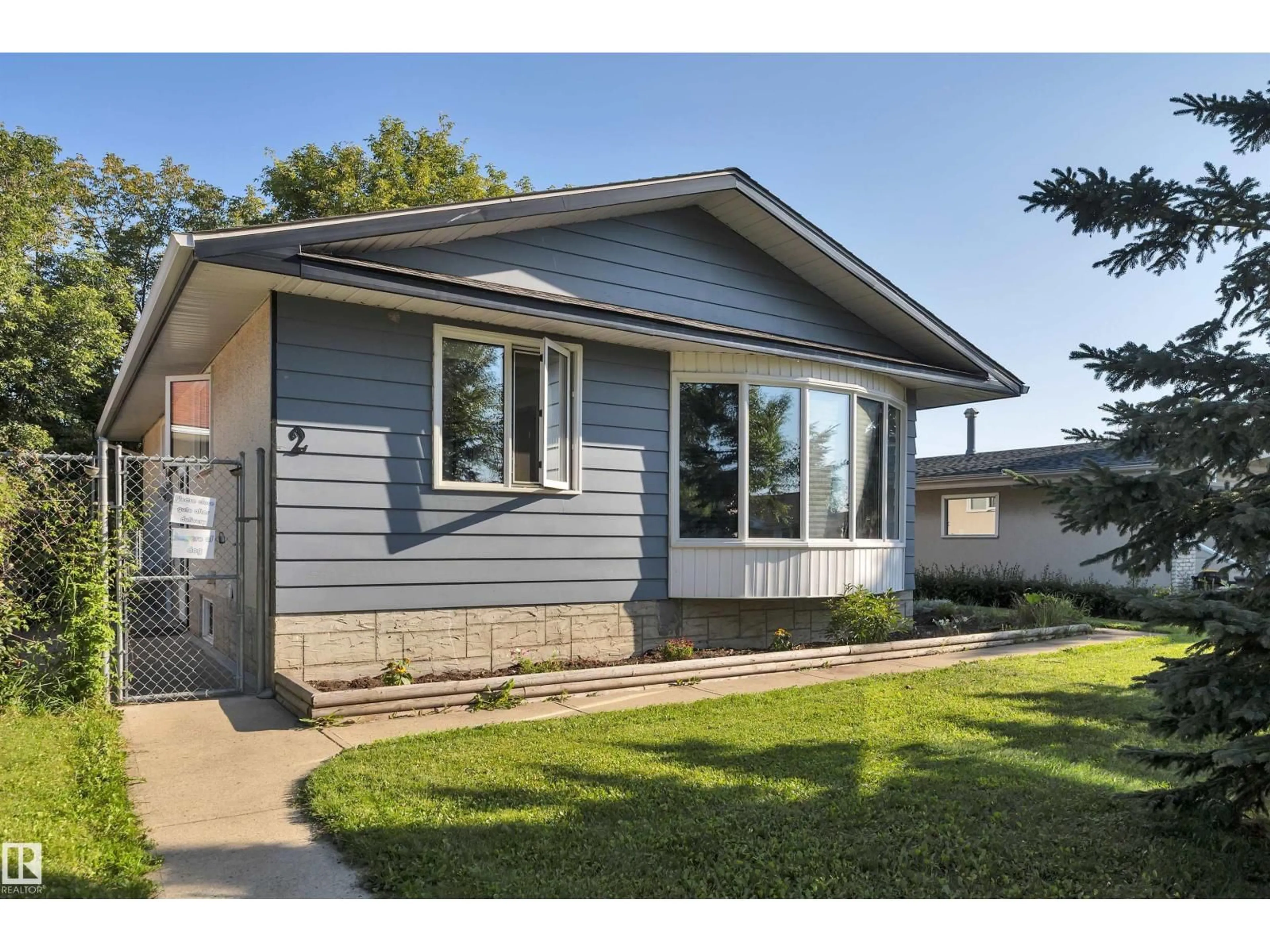 Home with vinyl exterior material, street for 2 CAMELOT PL, Leduc Alberta T9E4C4