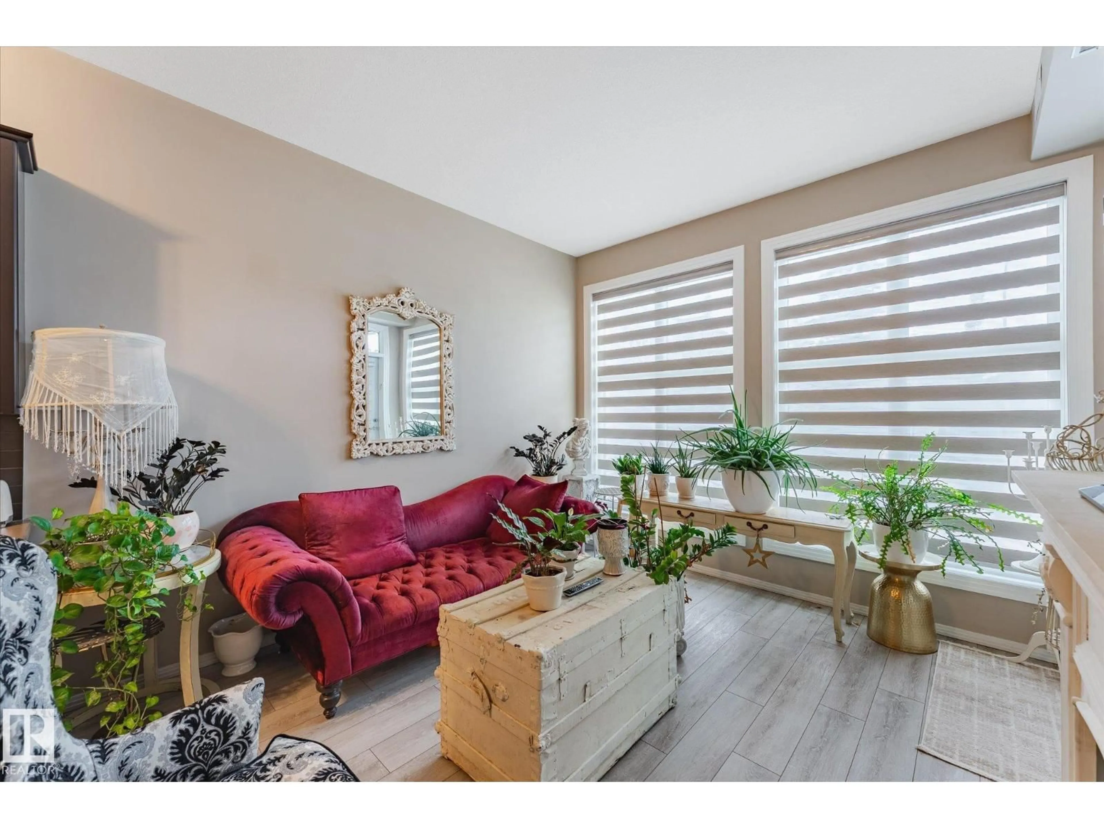 Living room with furniture, wood/laminate floor for #103 - 10531 117 ST, Edmonton Alberta T5H0A8