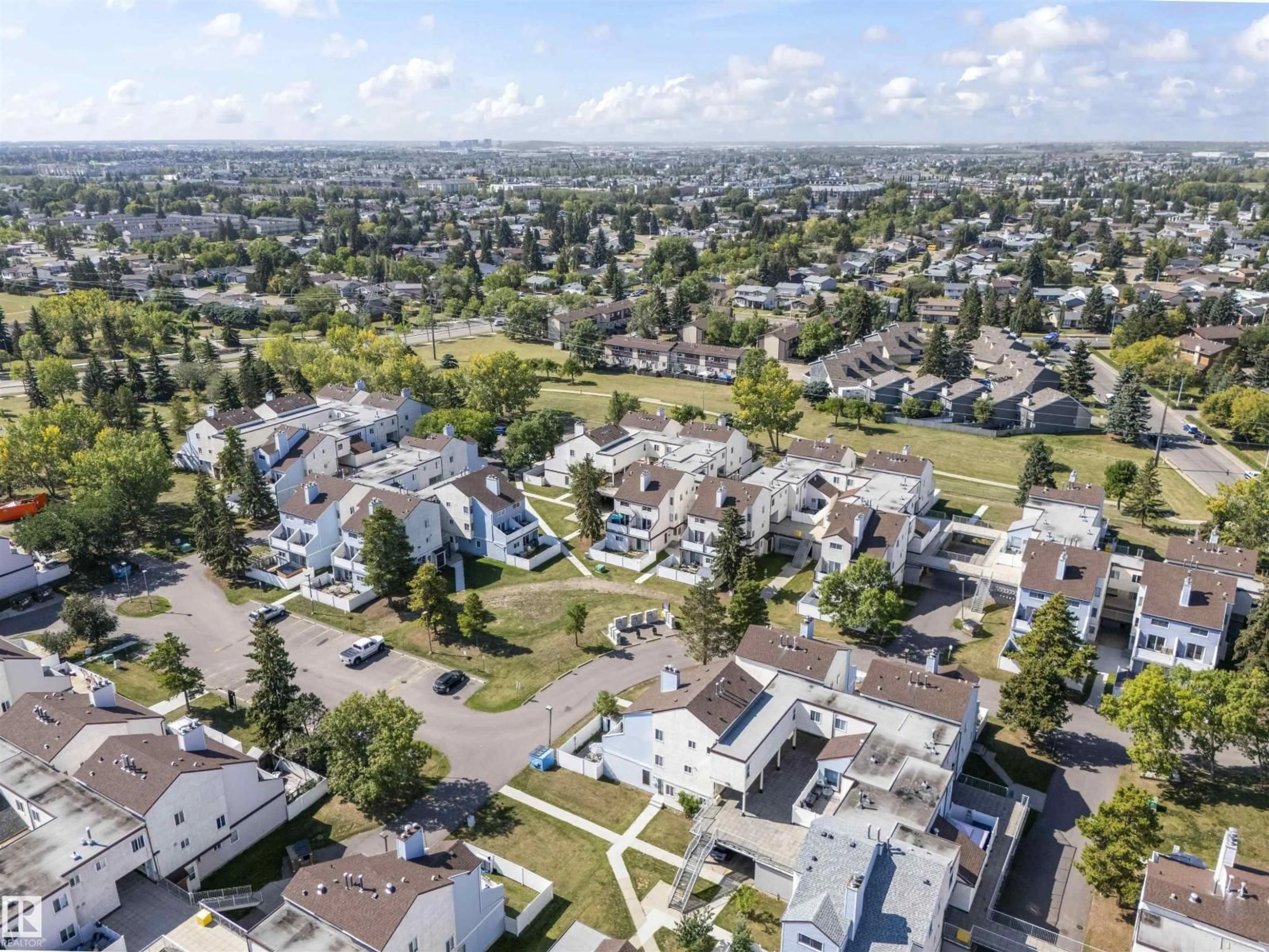 A pic from outside/outdoor area/front of a property/back of a property/a pic from drone, street for 255 LANCASTER TC, Edmonton Alberta T5X5T6