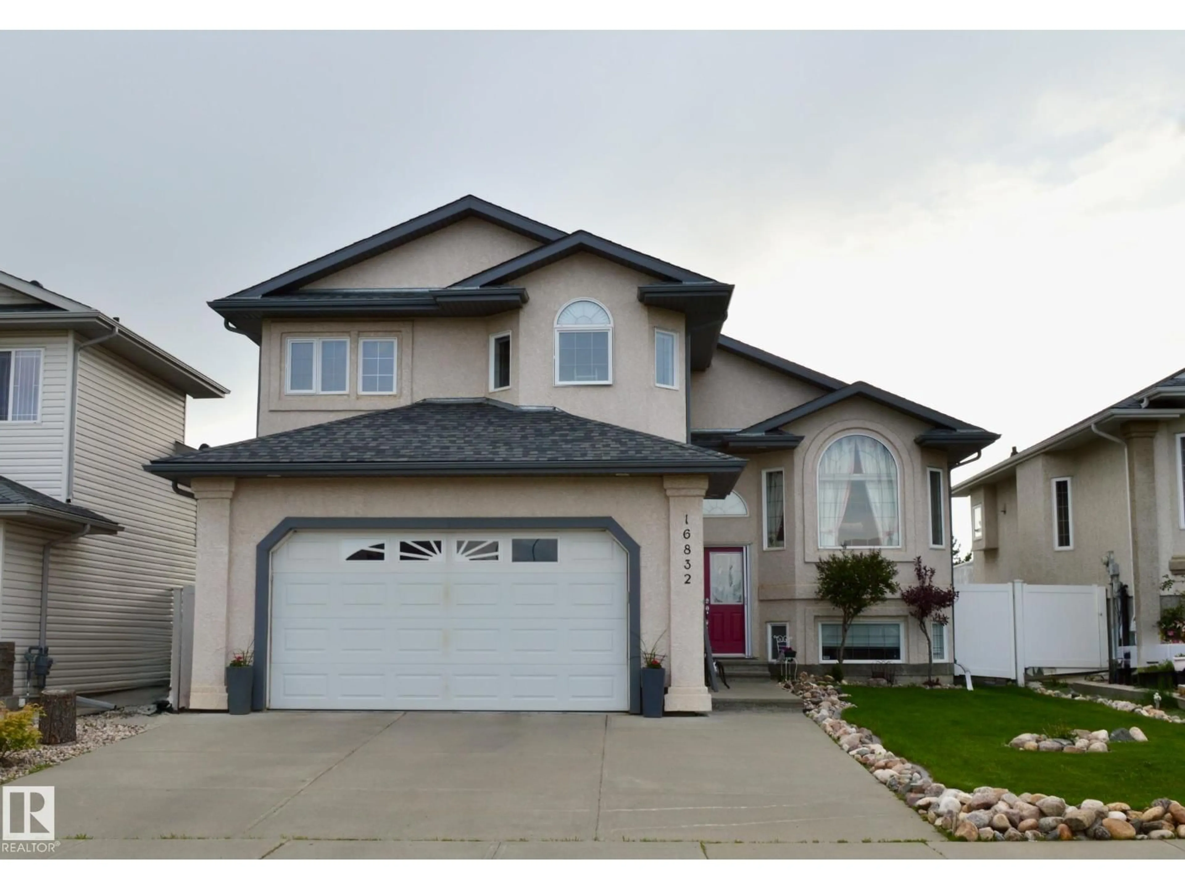 Home with vinyl exterior material, street for NW - 16832 79 ST, Edmonton Alberta T5Z3Y9