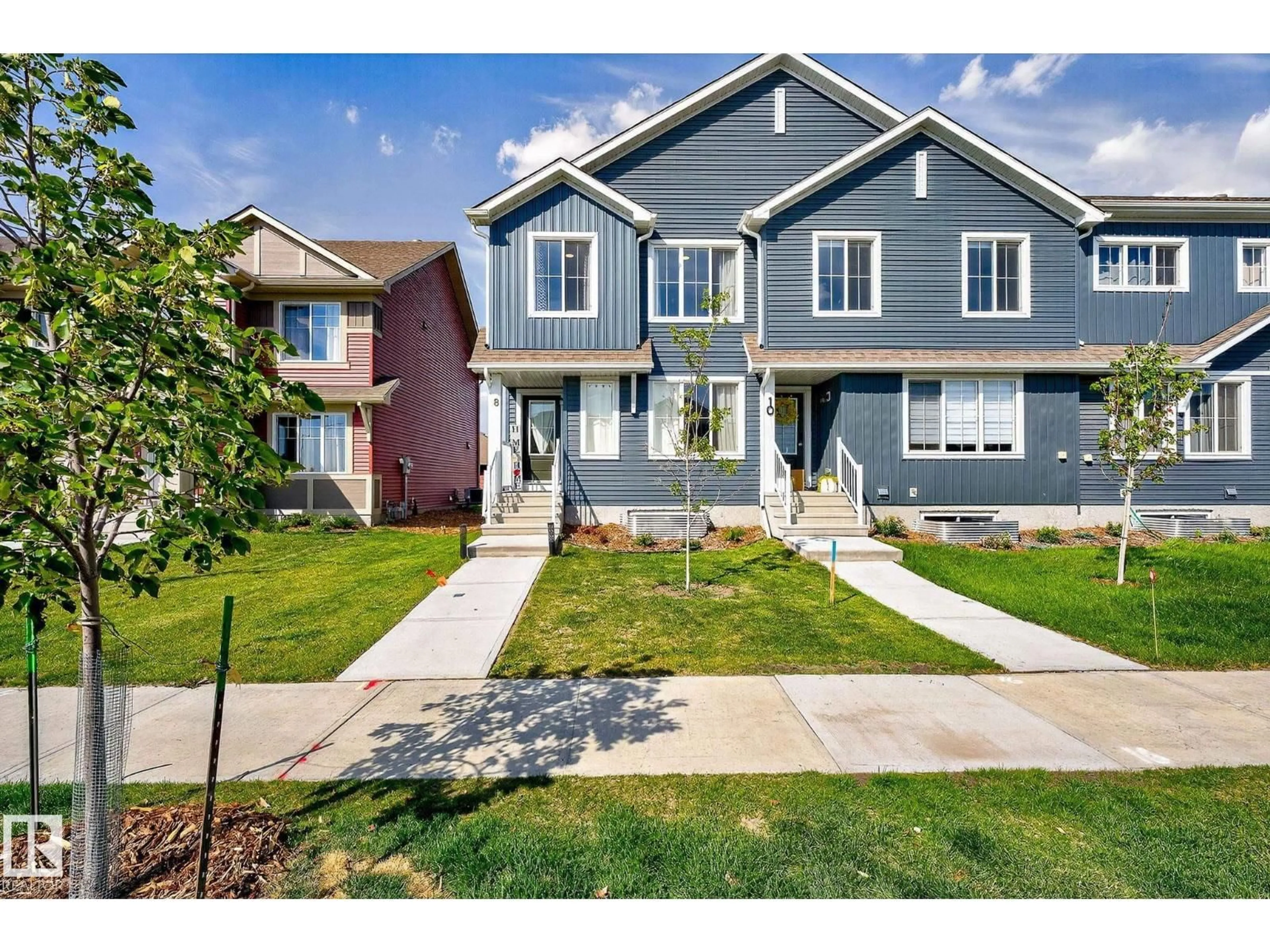 Home with vinyl exterior material, street for 8 ELLIOTT WD, Fort Saskatchewan Alberta T8L0Z4