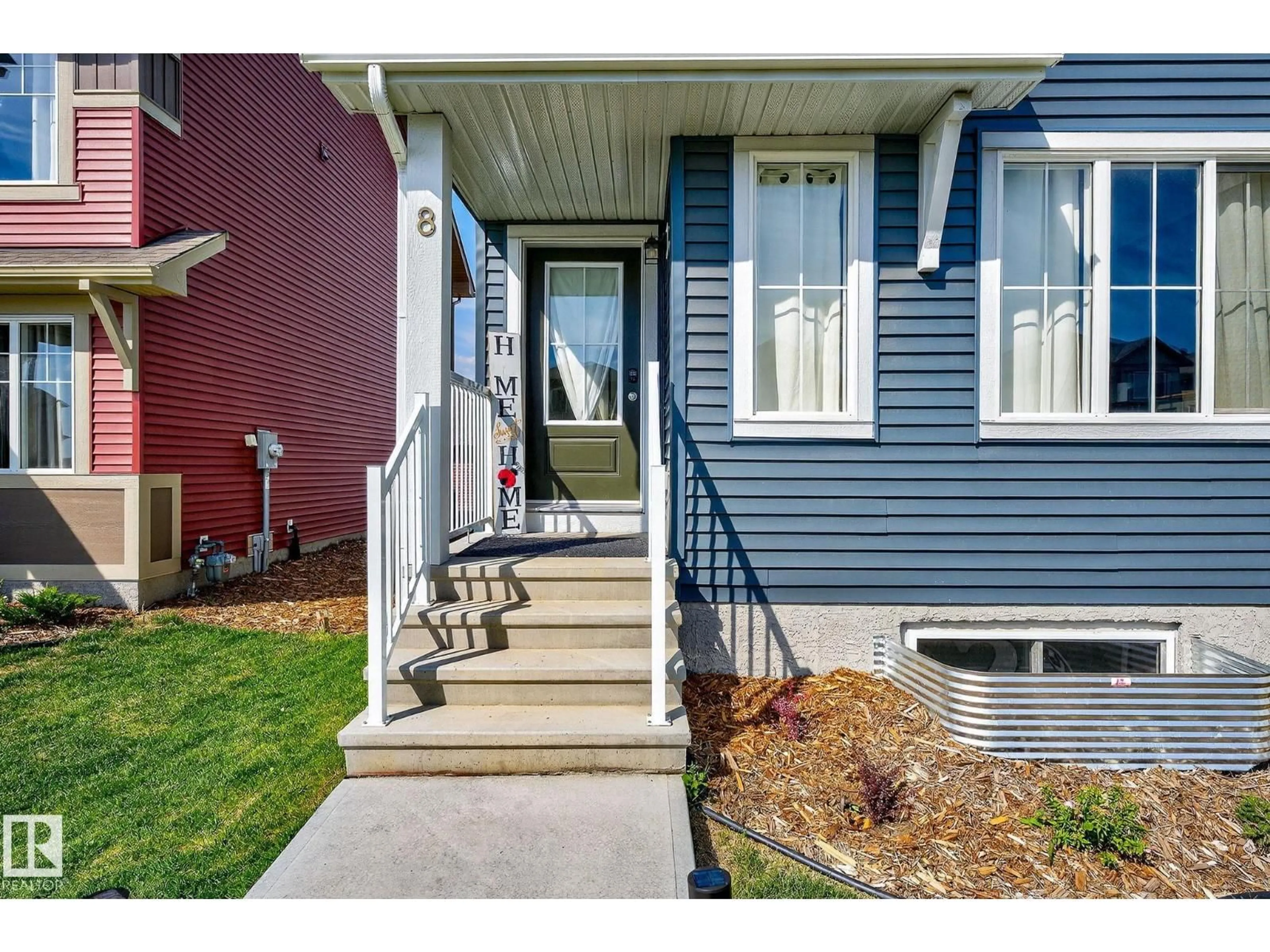 Home with vinyl exterior material, street for 8 ELLIOTT WD, Fort Saskatchewan Alberta T8L0Z4
