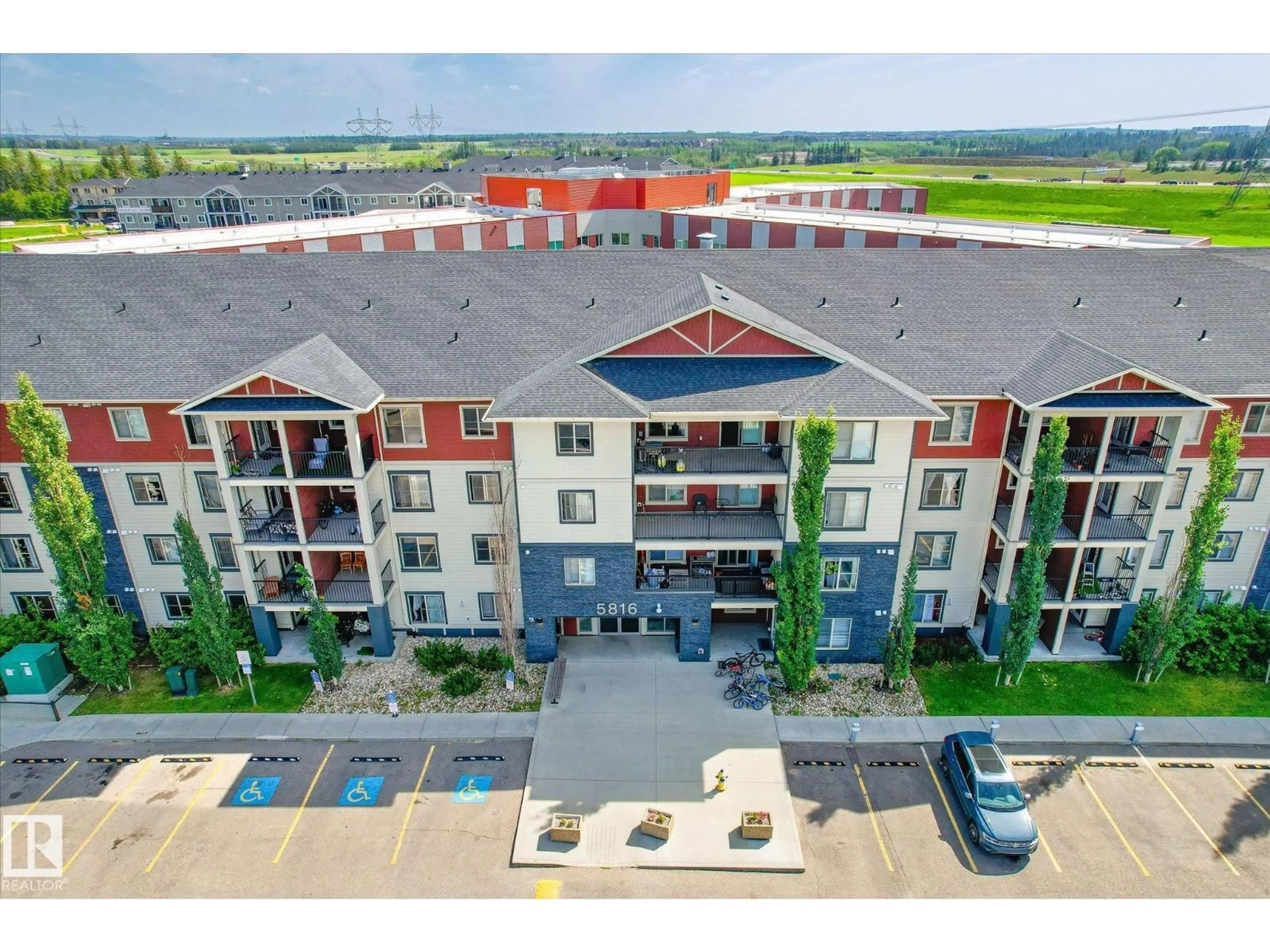 A pic from outside/outdoor area/front of a property/back of a property/a pic from drone, building for 5816 - 120 MULLEN PL, Edmonton Alberta T6R0W3