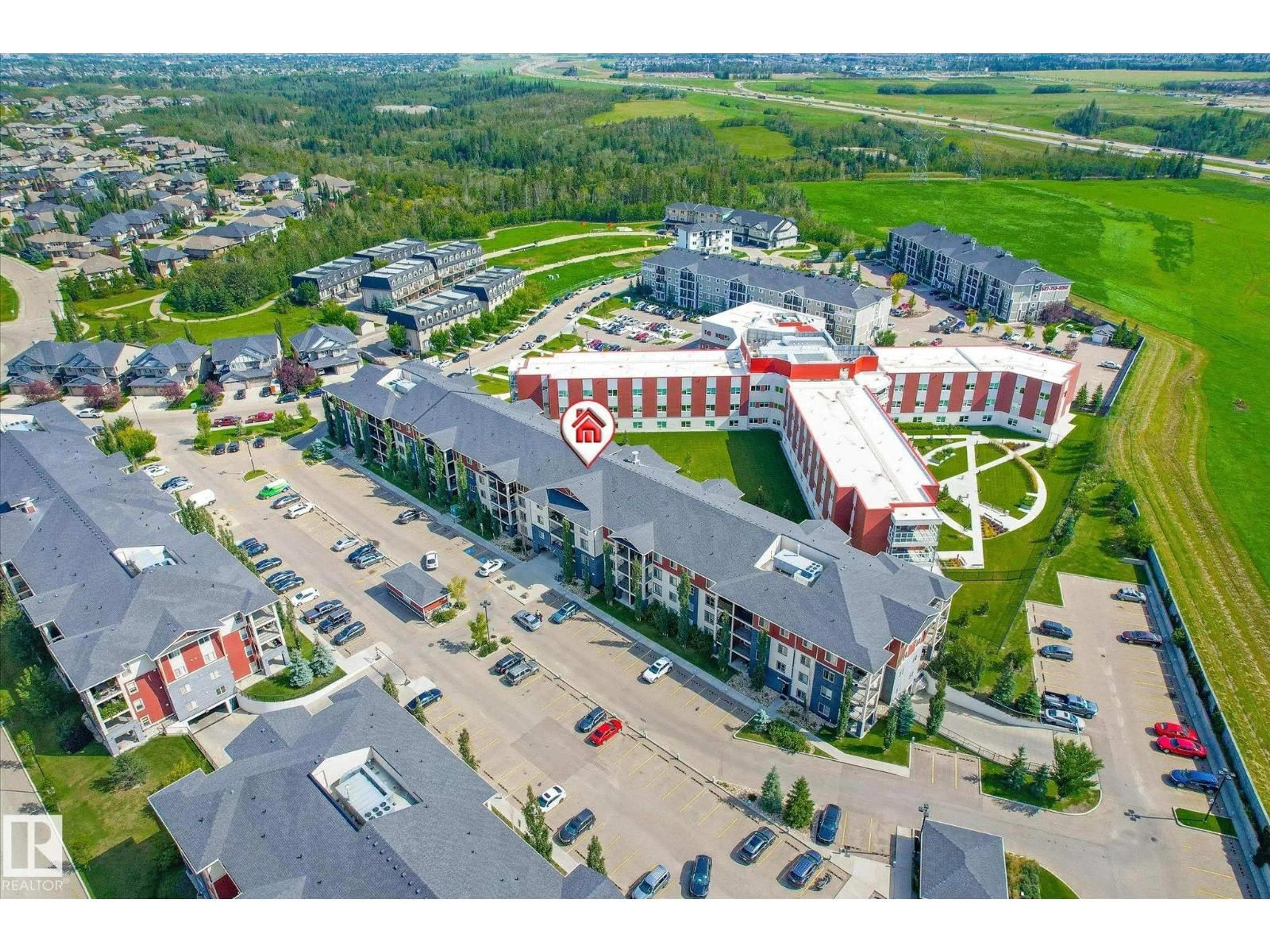 A pic from outside/outdoor area/front of a property/back of a property/a pic from drone, building for 5816 - 120 MULLEN PL, Edmonton Alberta T6R0W3
