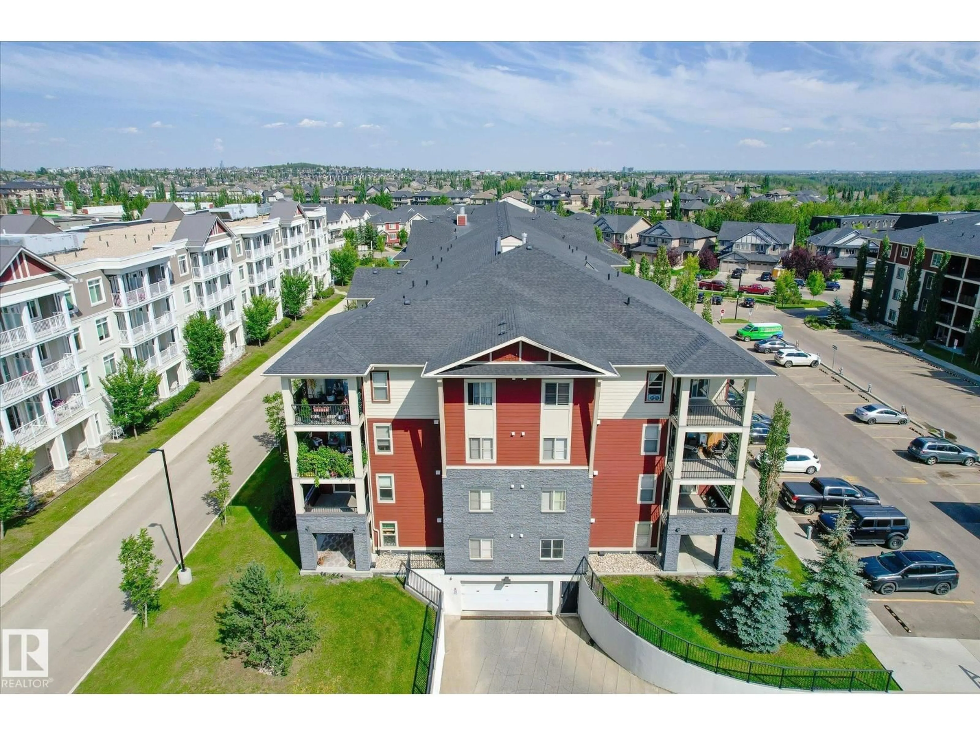 A pic from outside/outdoor area/front of a property/back of a property/a pic from drone, building for #204 - 5804 MULLEN PL, Edmonton Alberta T6R0W3