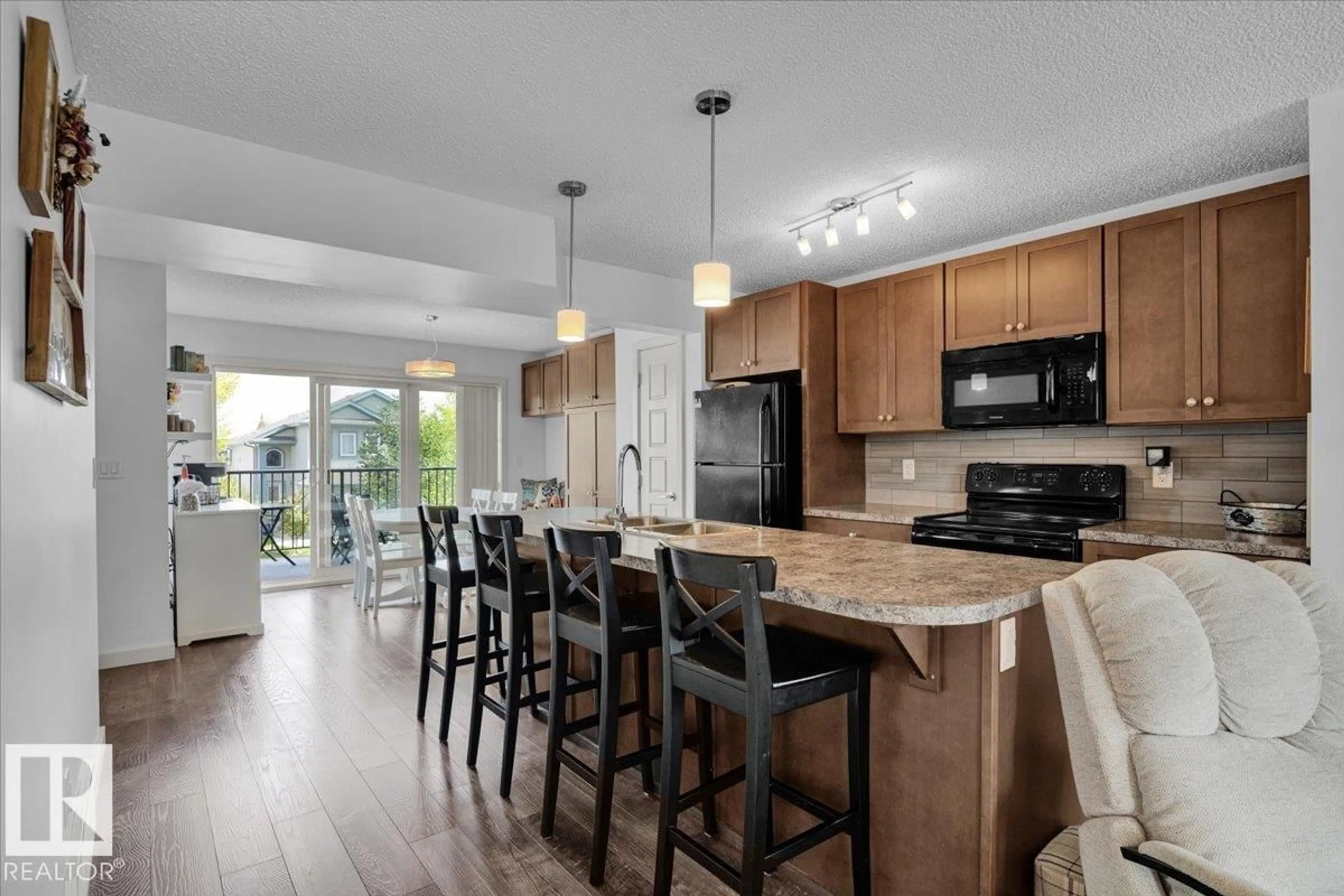Open concept kitchen, unknown for NW - 1628 33A ST, Edmonton Alberta T6T0Y1