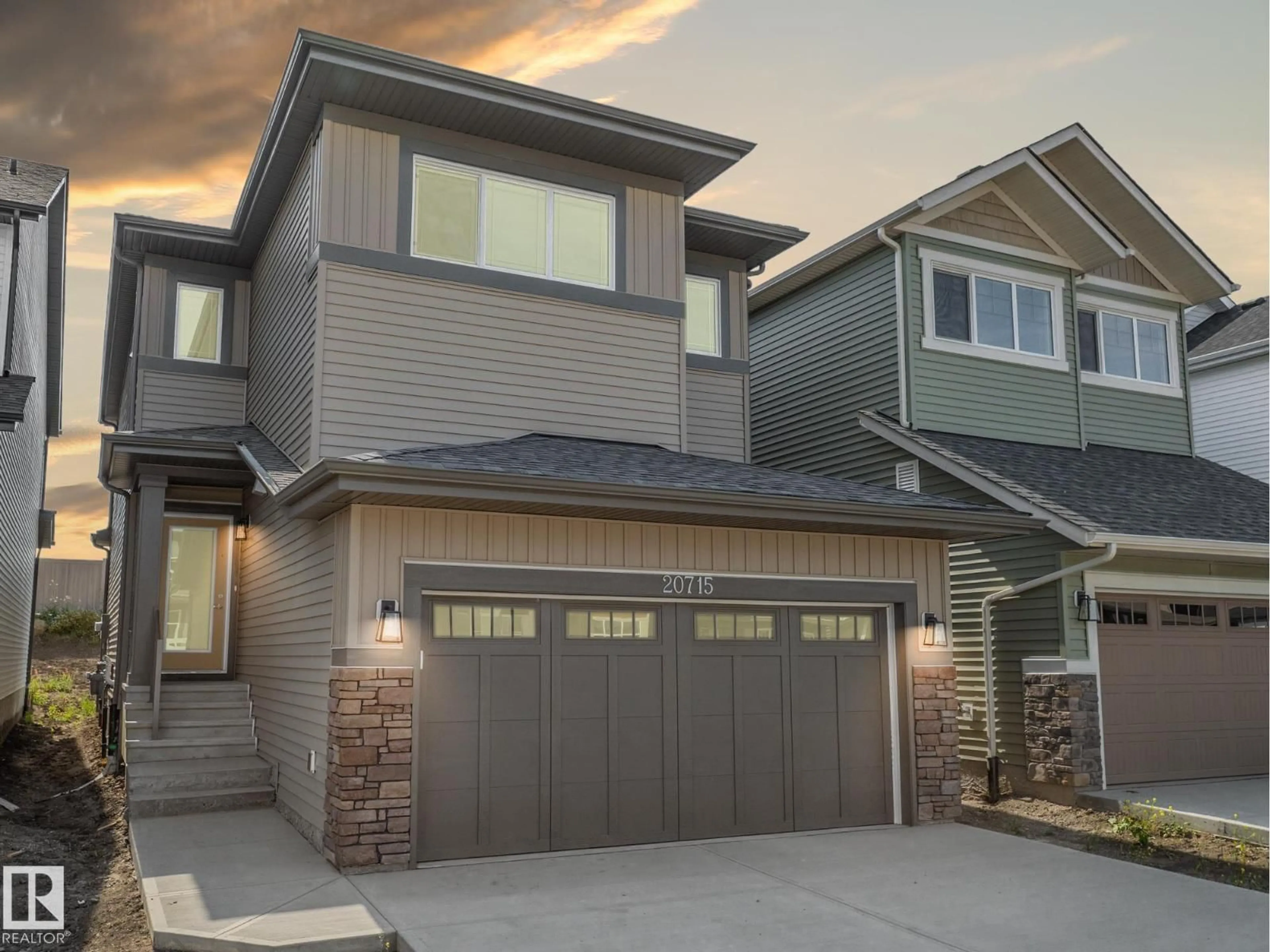 Home with vinyl exterior material, street for 20715 24 AV, Edmonton Alberta T6M2C4