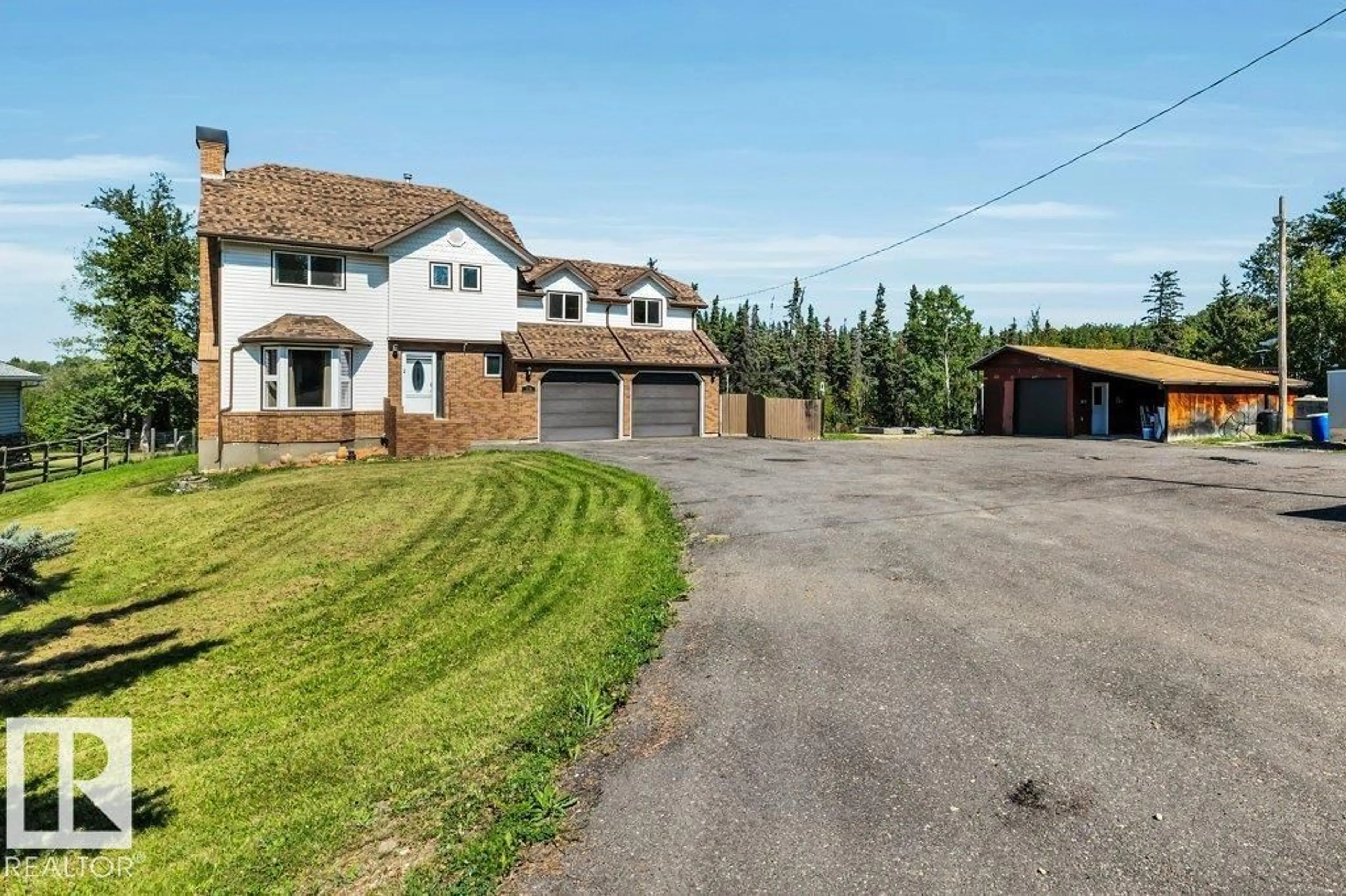 A pic from outside/outdoor area/front of a property/back of a property/a pic from drone, street for 188-52343 RGE RD 211, Rural Strathcona County Alberta T8G1A5