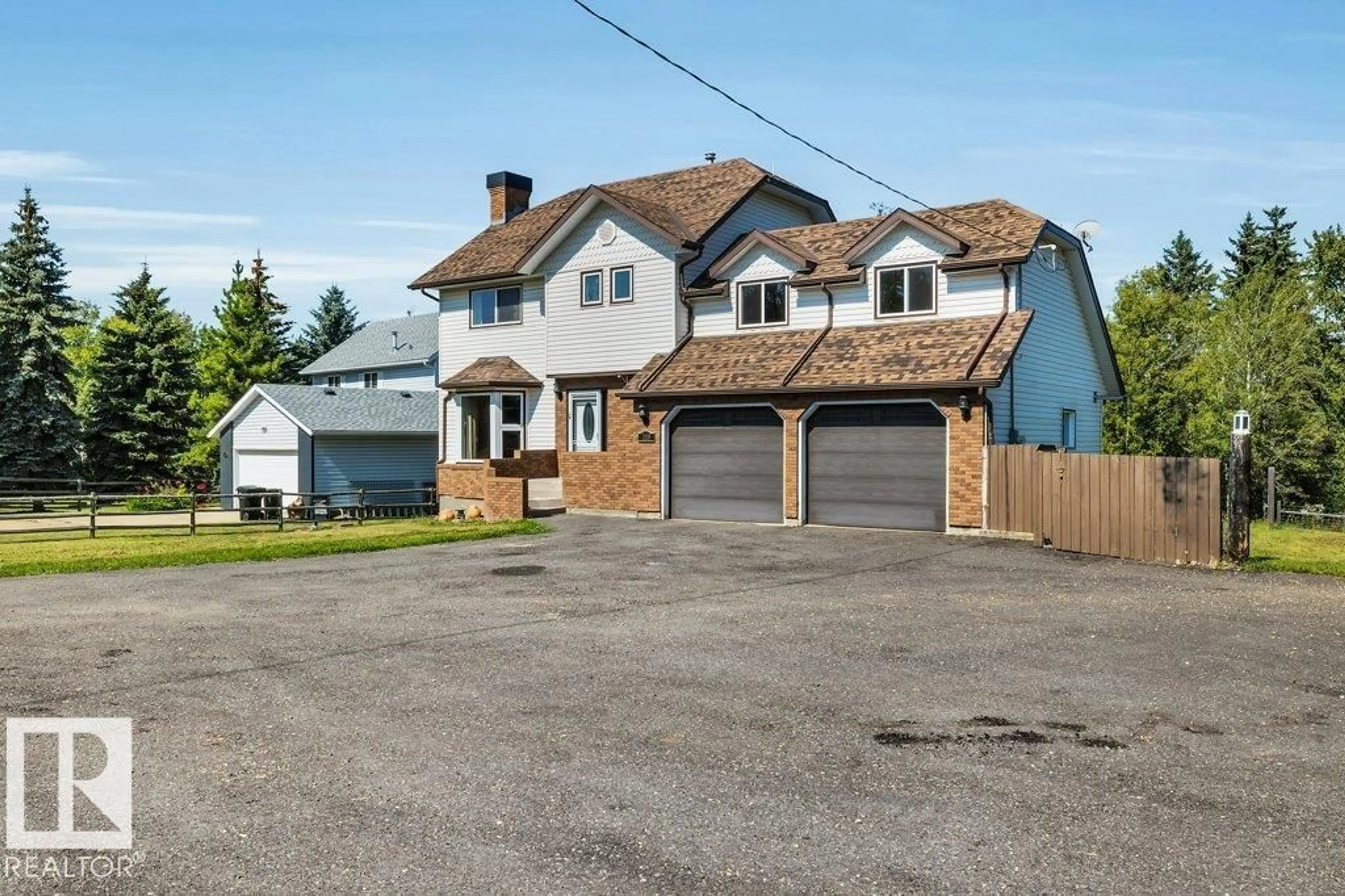 A pic from outside/outdoor area/front of a property/back of a property/a pic from drone, street for 188-52343 RGE RD 211, Rural Strathcona County Alberta T8G1A5