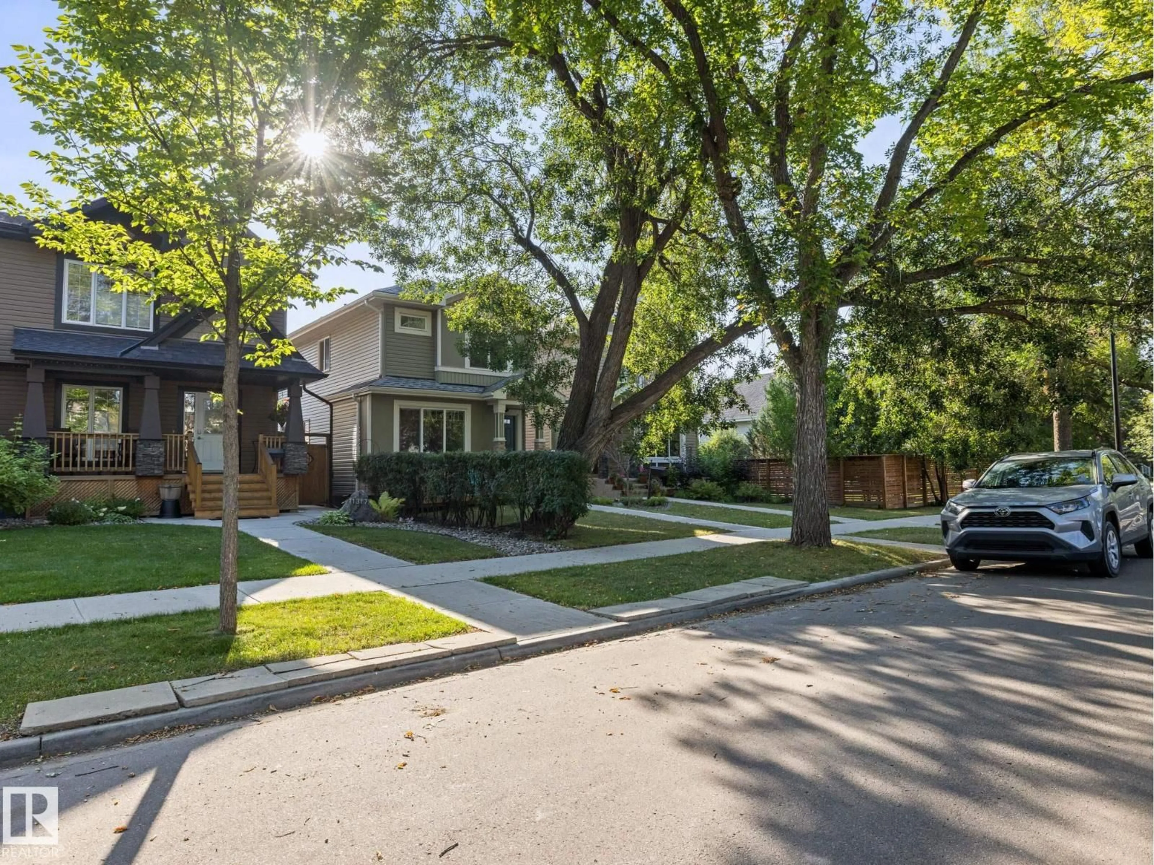 Home with brick exterior material, street for NW - 11315 123 ST, Edmonton Alberta T5M0G1