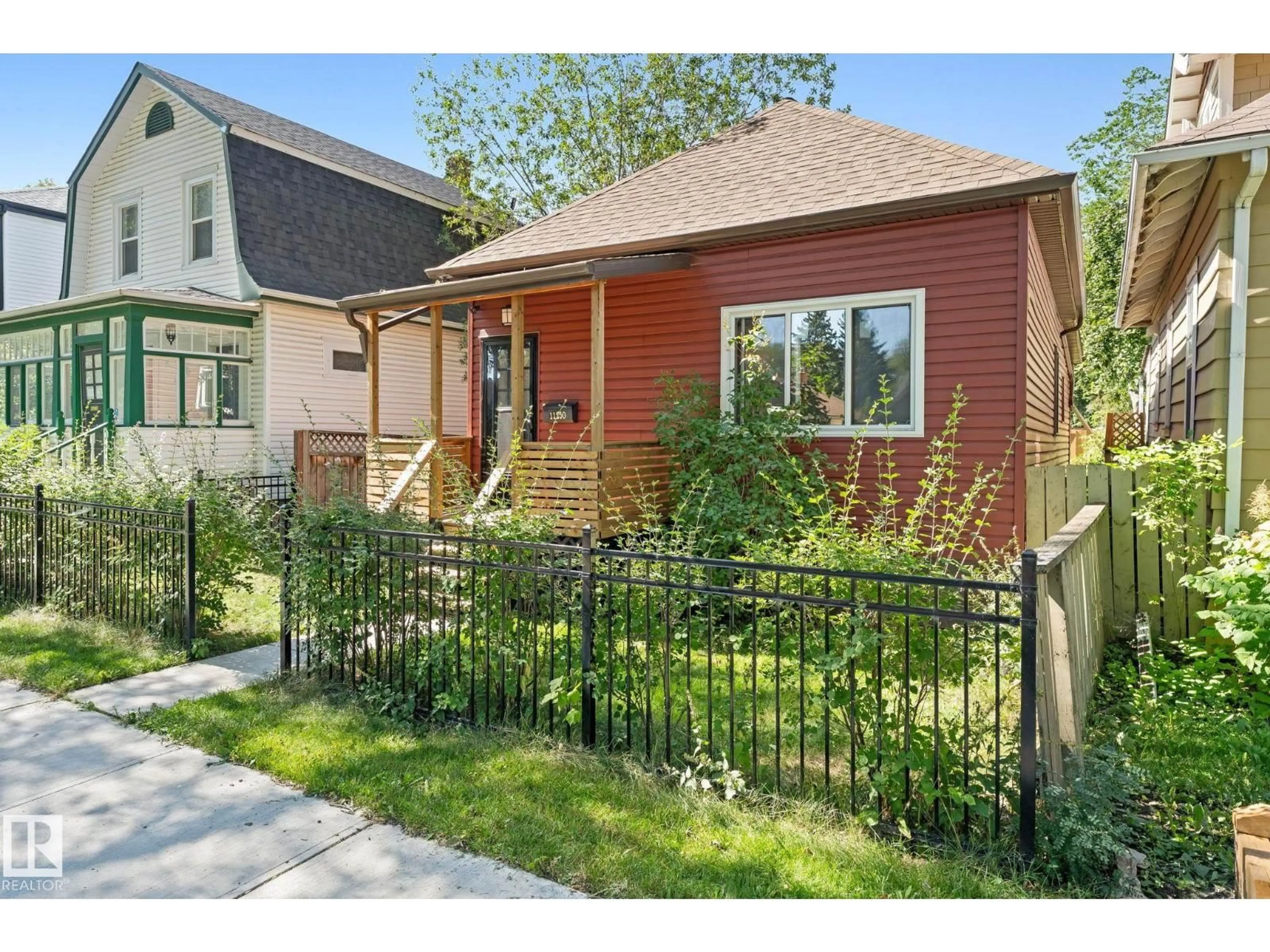 Home with brick exterior material, street for 11250 92 ST, Edmonton Alberta T5G0Z1