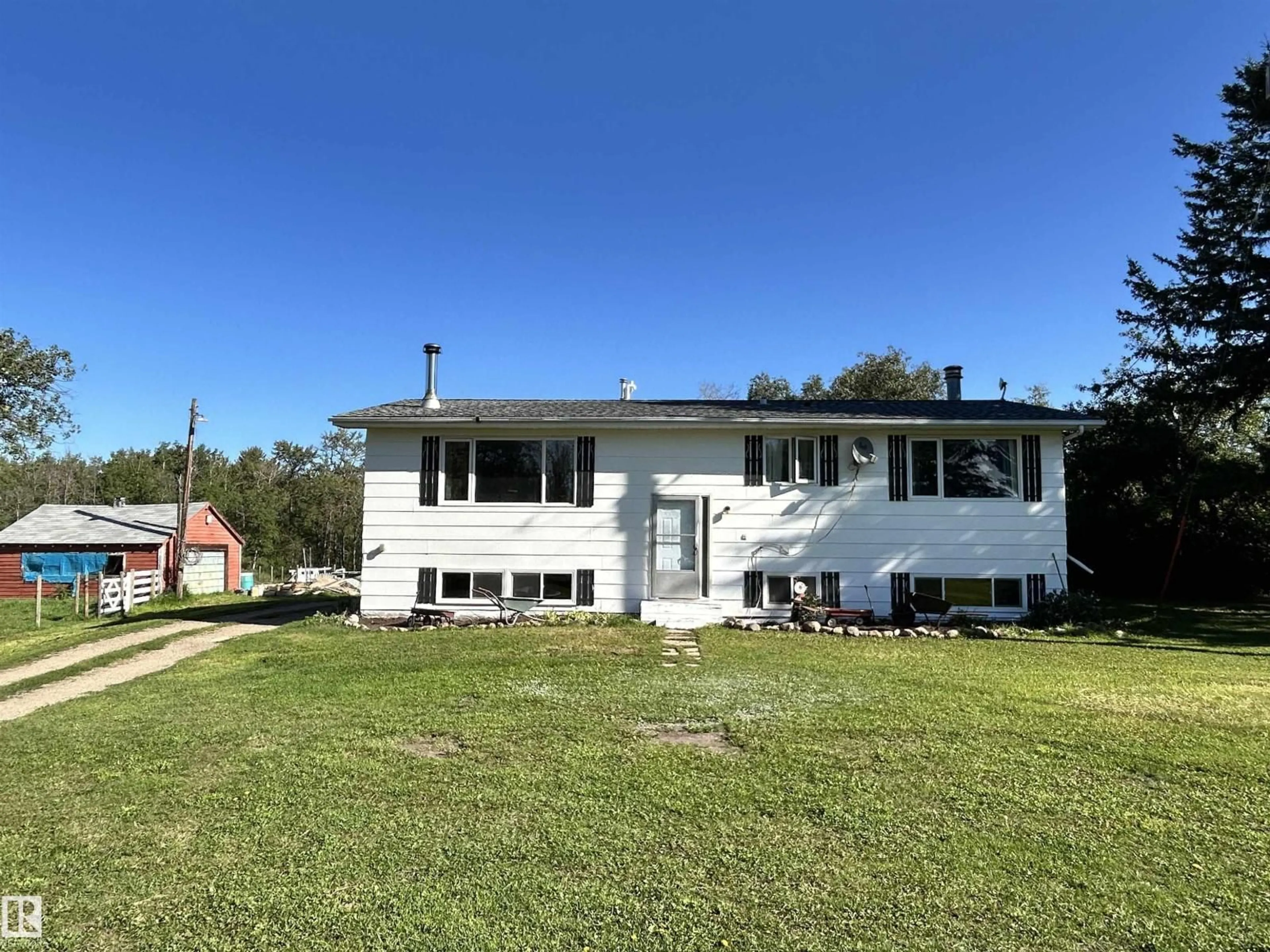 A pic from outside/outdoor area/front of a property/back of a property/a pic from drone, unknown for 19506 TWP RD 504, Rural Beaver County Alberta T0B4J2