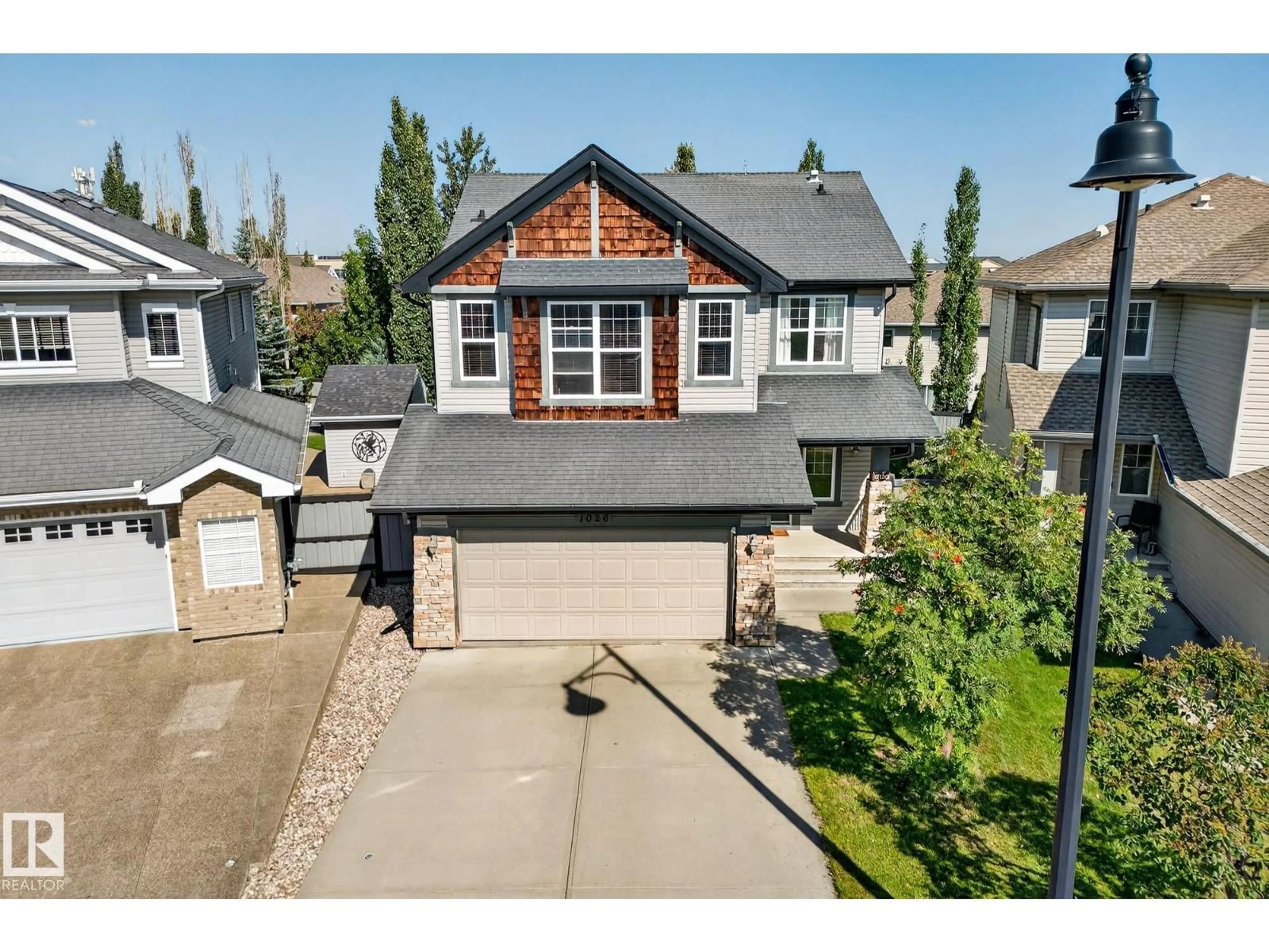 A pic from outside/outdoor area/front of a property/back of a property/a pic from drone, street for NW - 1026 MCKINNEY GR, Edmonton Alberta T6R3S4