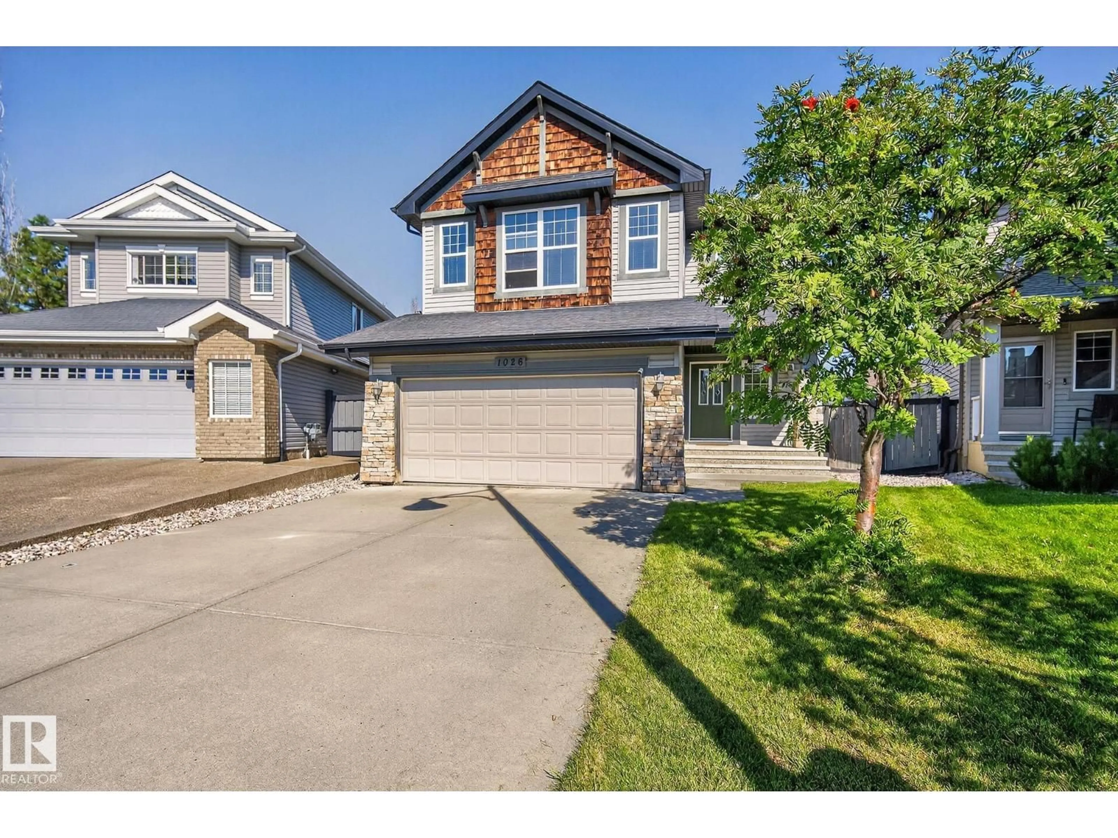 Home with vinyl exterior material, street for NW - 1026 MCKINNEY GR, Edmonton Alberta T6R3S4