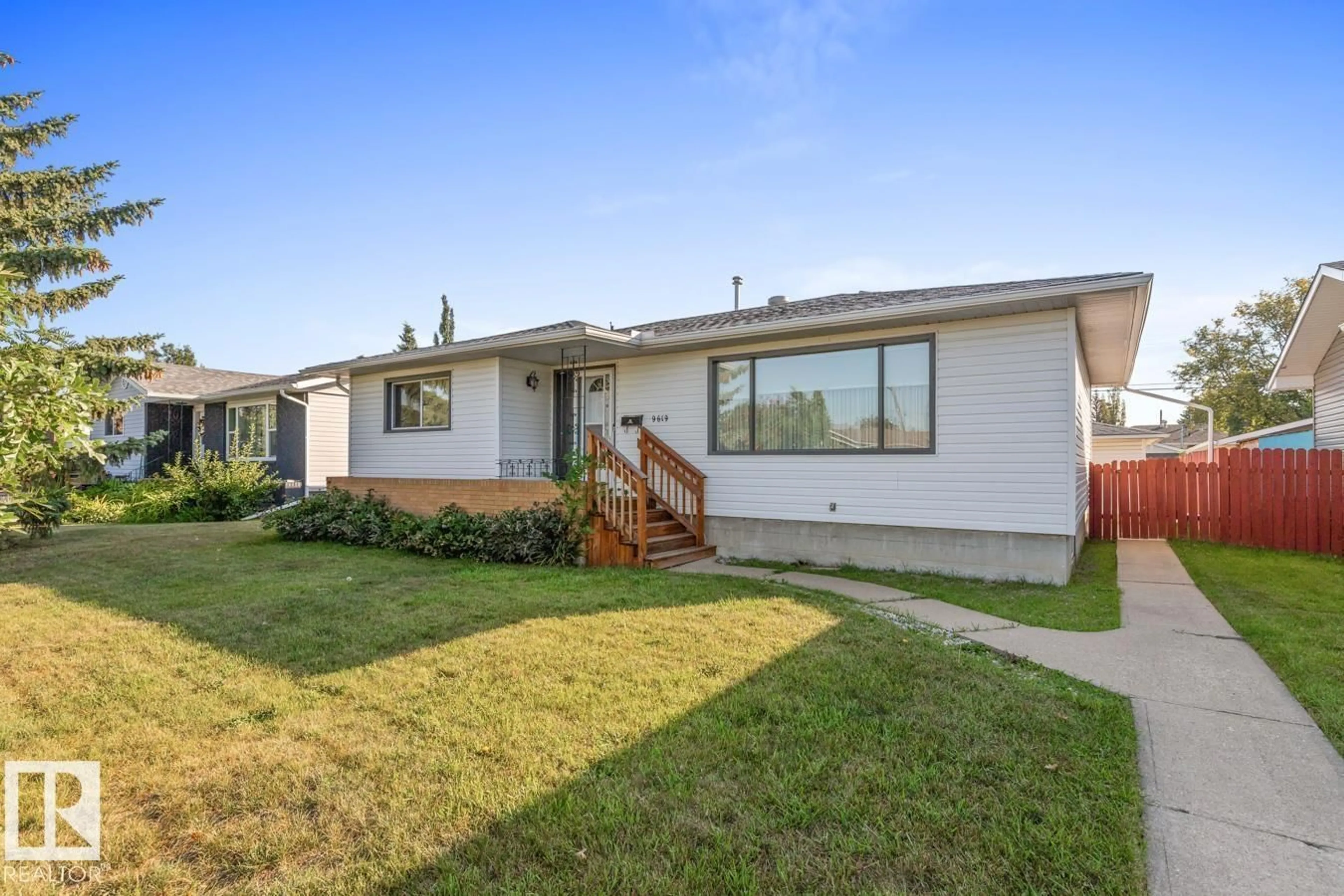 Home with vinyl exterior material, street for NW - 9619 69 A ST, Edmonton Alberta T6B1W4