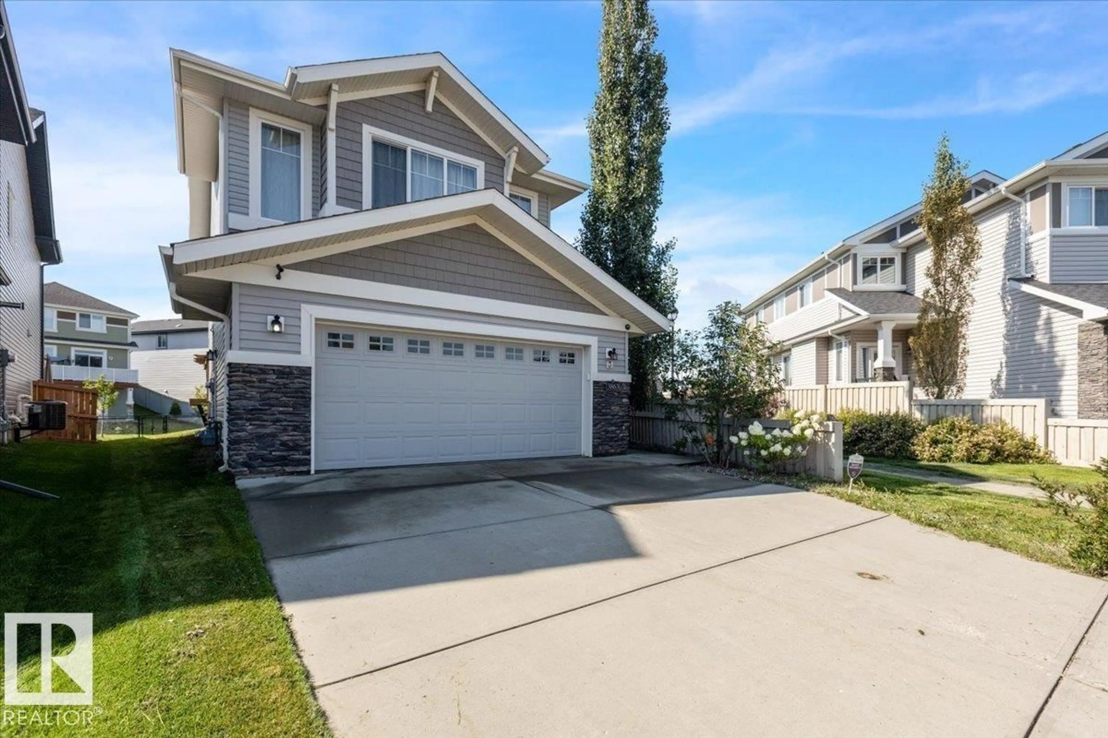 Home with vinyl exterior material, street for 3863 AGAR GREEN GR SW, Edmonton Alberta T6W0W9