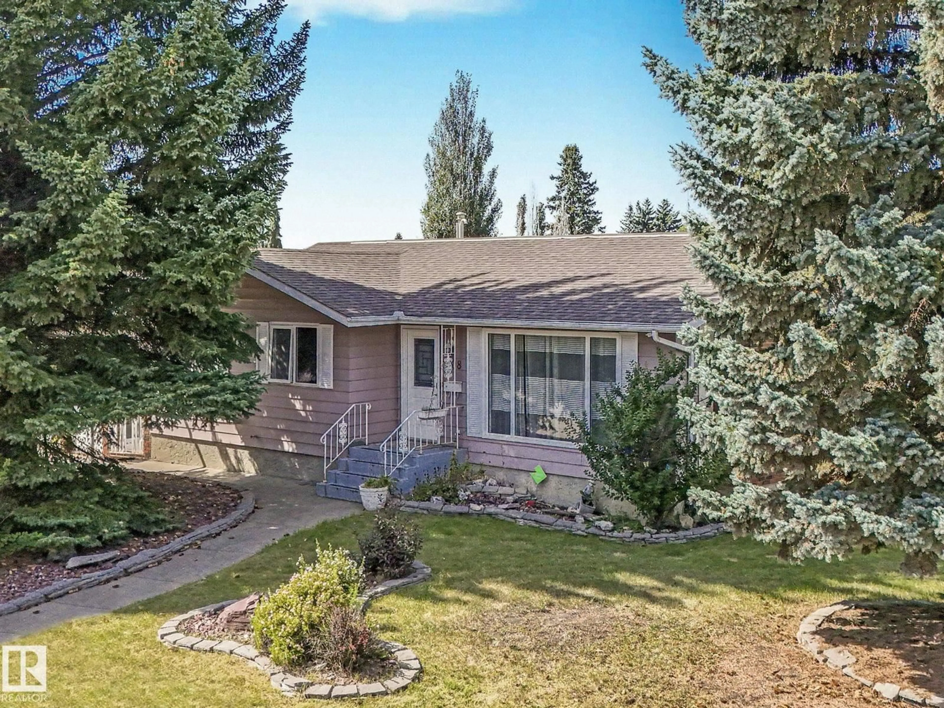 A pic from outside/outdoor area/front of a property/back of a property/a pic from drone, mountain view for 1408 76 ST, Edmonton Alberta T6K2R9