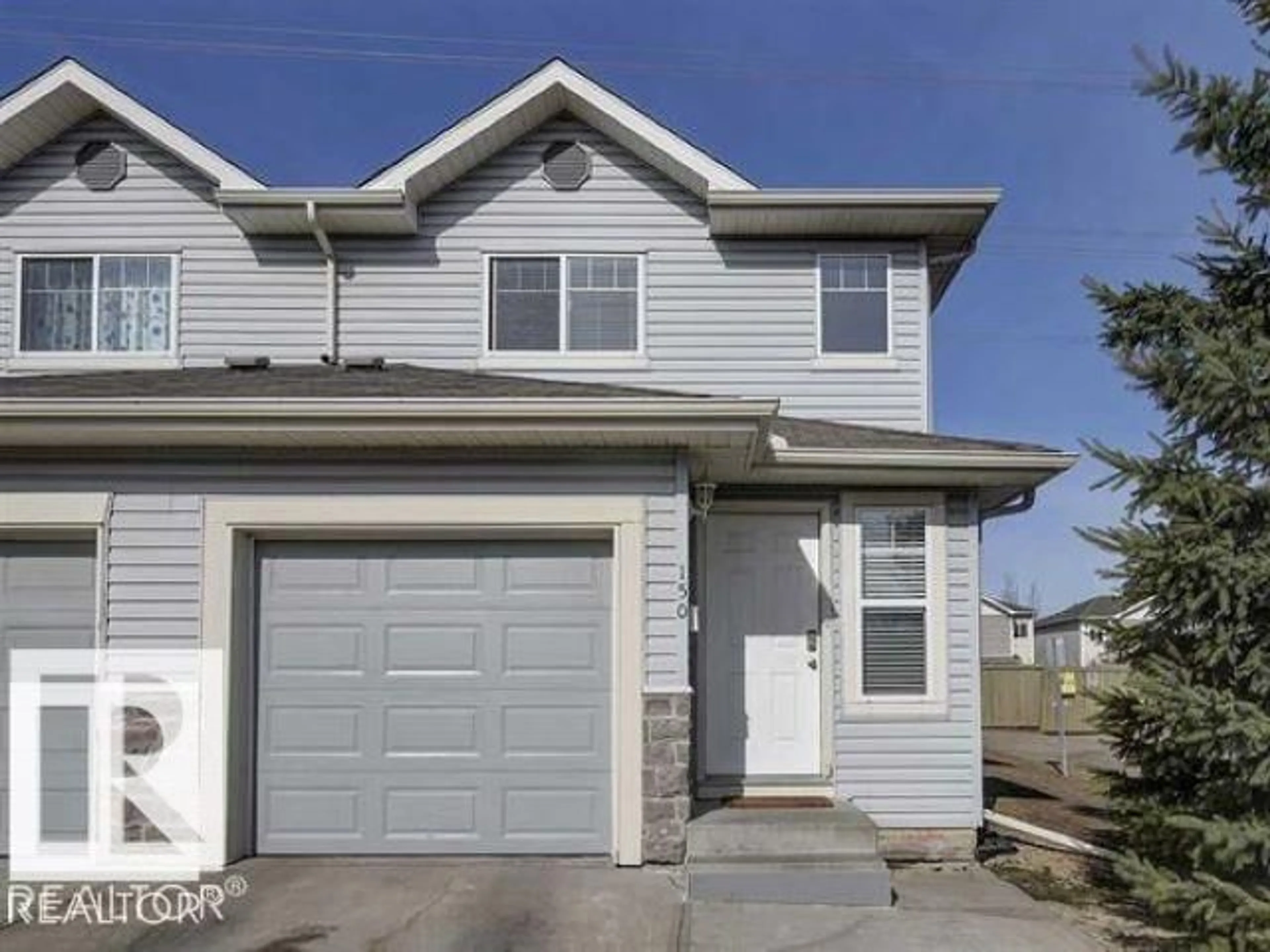 Home with vinyl exterior material, street for 230 - 150 EDWARDS DR, Edmonton Alberta T6X1G7