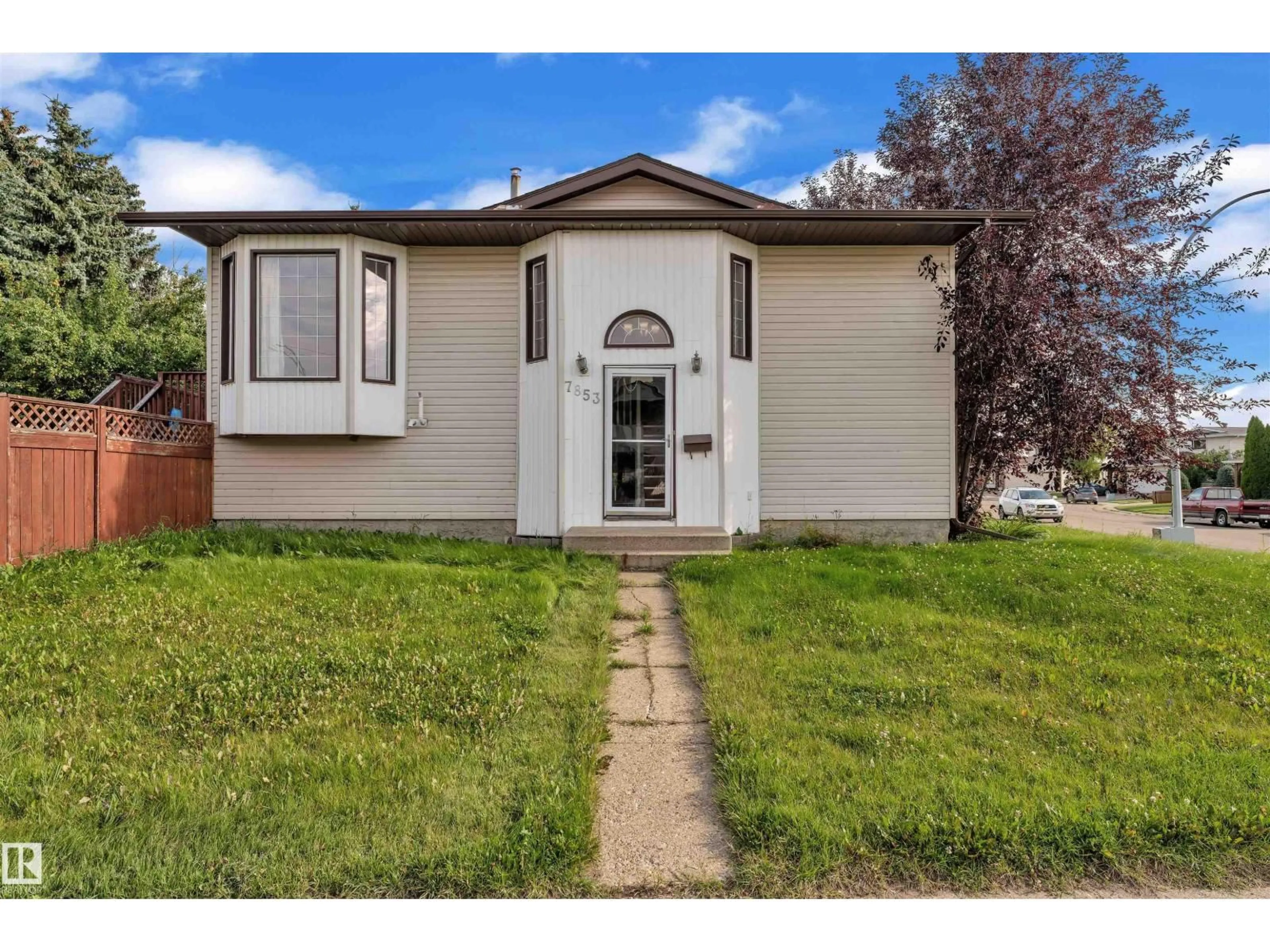 Home with vinyl exterior material, street for 7853 26 AV, Edmonton Alberta T6K3S7
