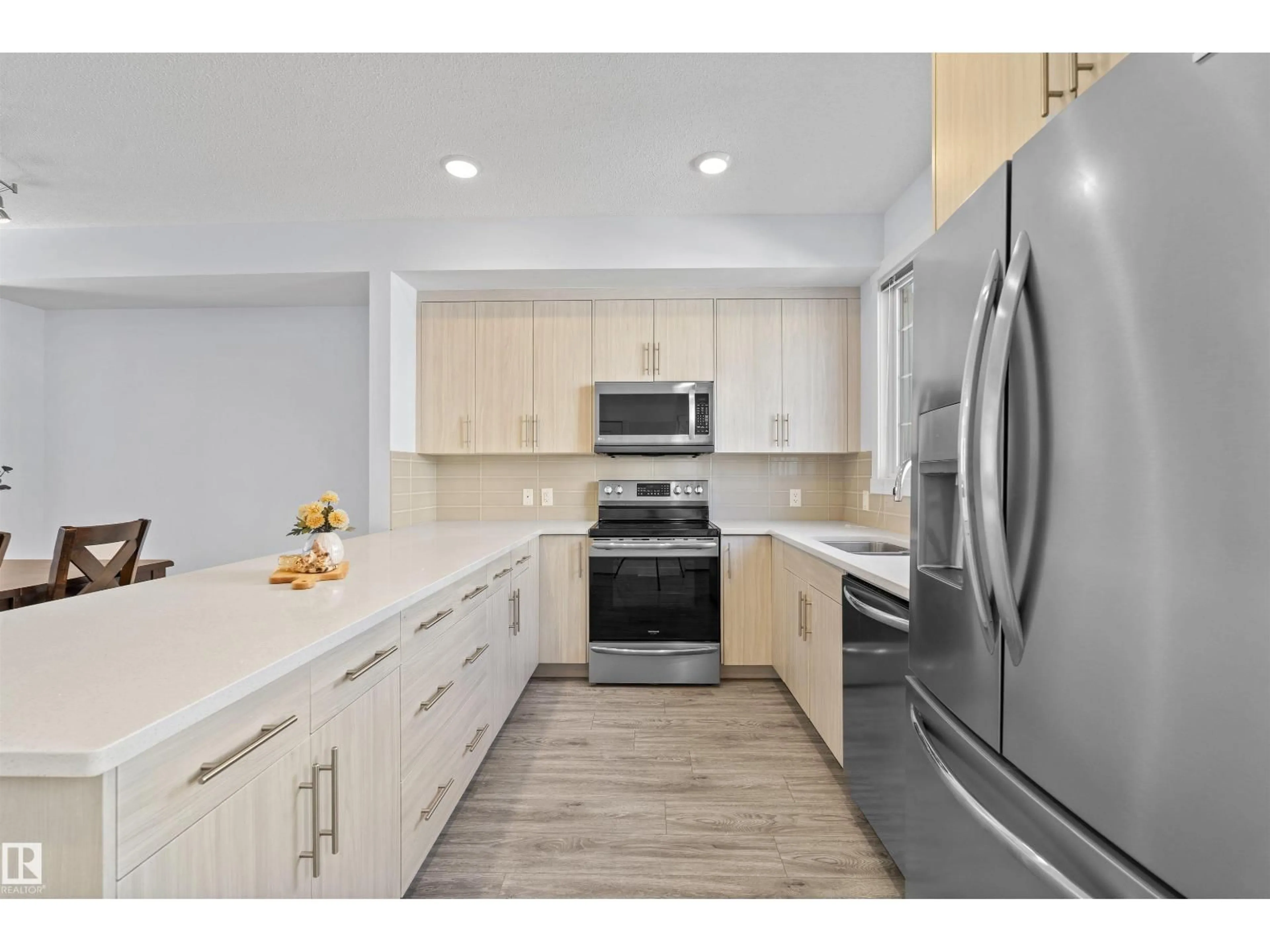 Open concept kitchen, ceramic/tile floor for 753 ALLARD BV, Edmonton Alberta T6W3W5