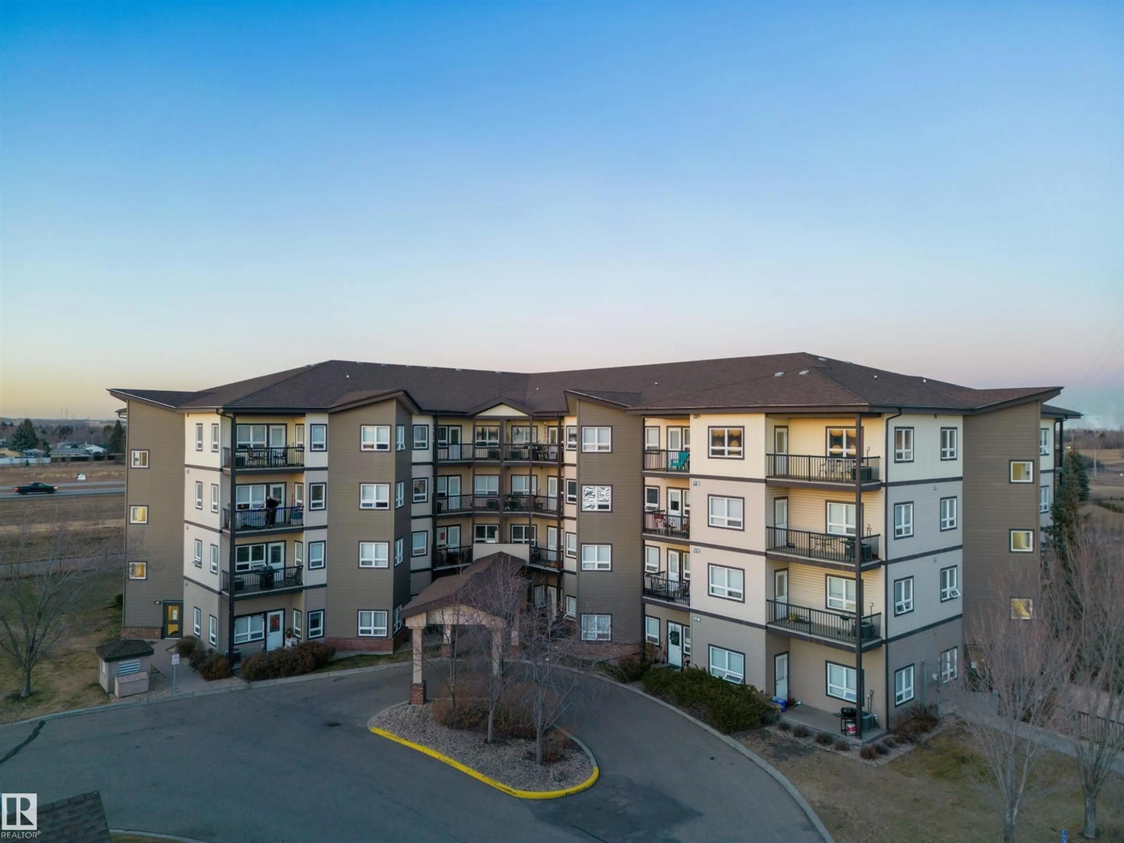 A pic from outside/outdoor area/front of a property/back of a property/a pic from drone, building for #403 - 8702 SOUTHFORT DR, Fort Saskatchewan Alberta T8L4R6