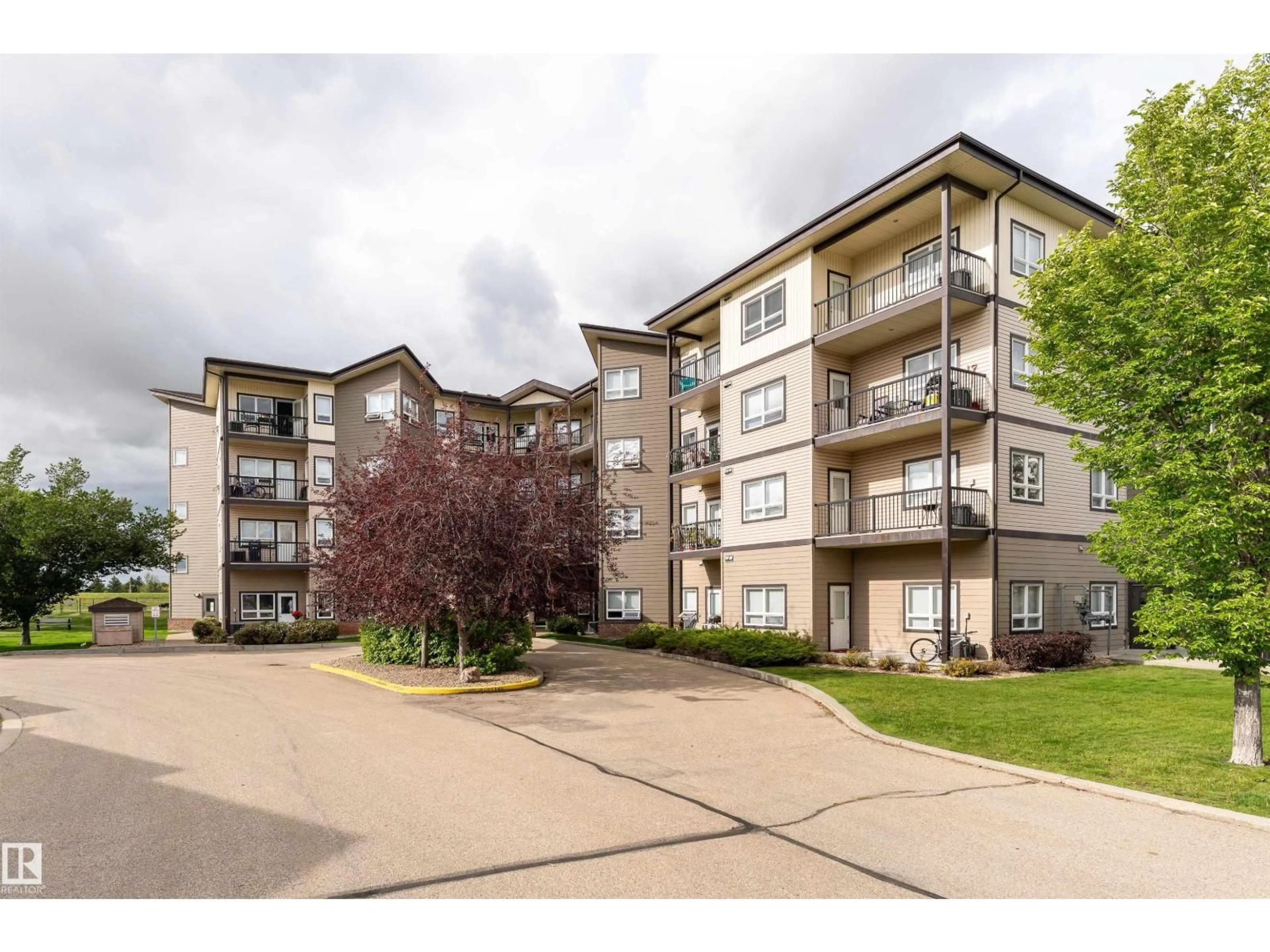 A pic from outside/outdoor area/front of a property/back of a property/a pic from drone, unknown for #403 - 8702 SOUTHFORT DR, Fort Saskatchewan Alberta T8L4R6