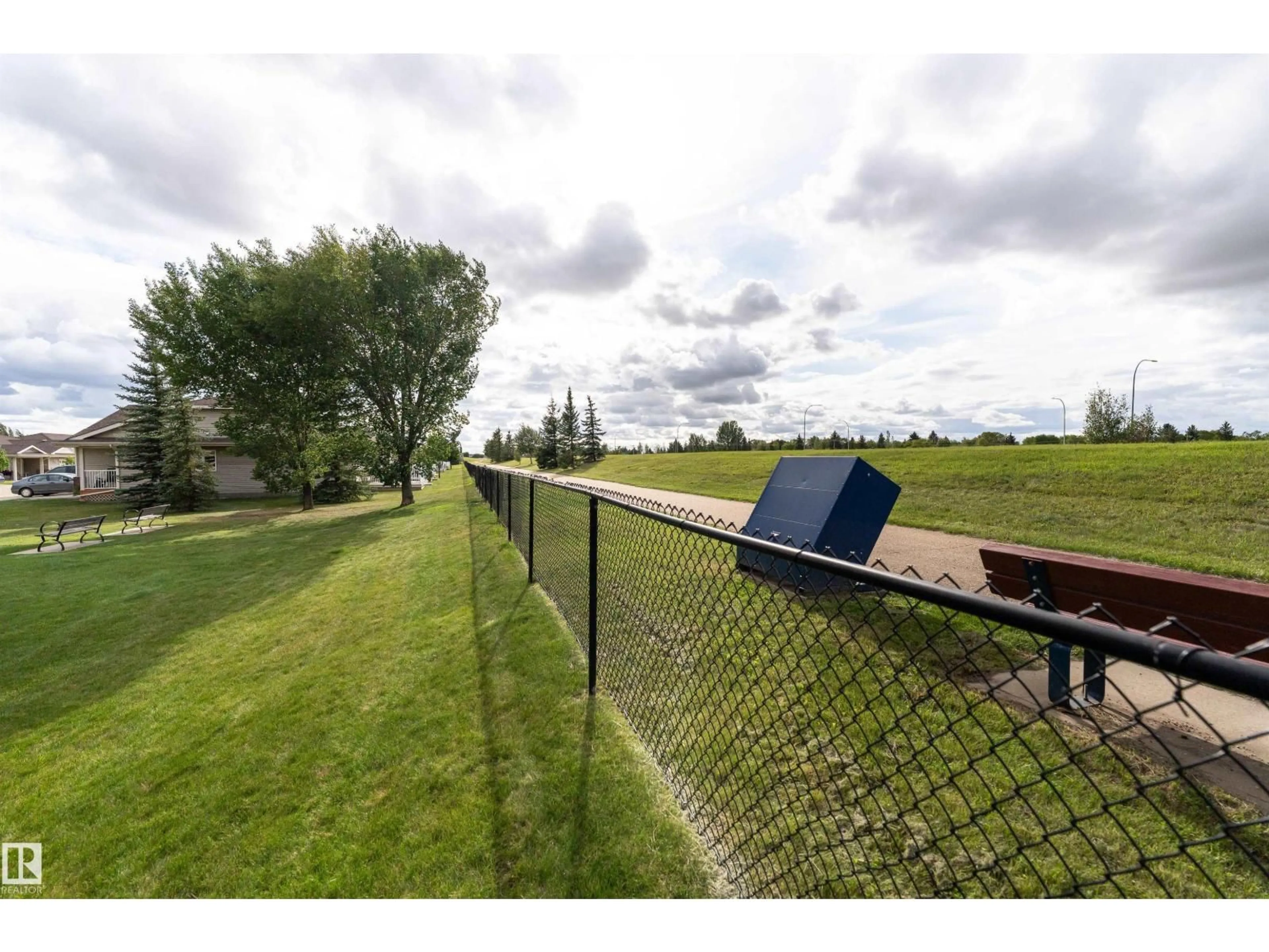 A pic from outside/outdoor area/front of a property/back of a property/a pic from drone, water/lake/river/ocean view for #403 - 8702 SOUTHFORT DR, Fort Saskatchewan Alberta T8L4R6