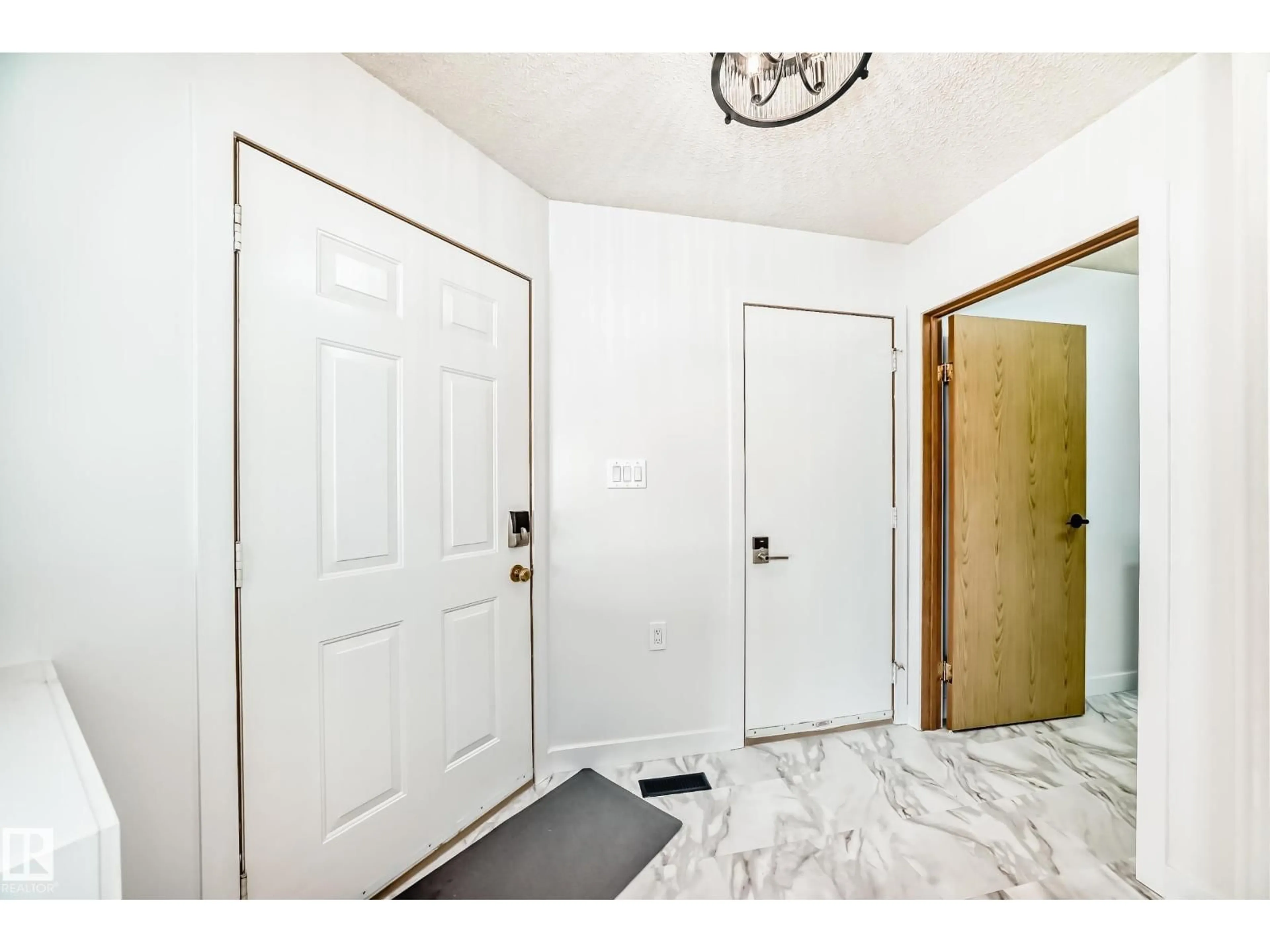 Indoor entryway for NW - 15571 59A ST, Edmonton Alberta T5Y2N9