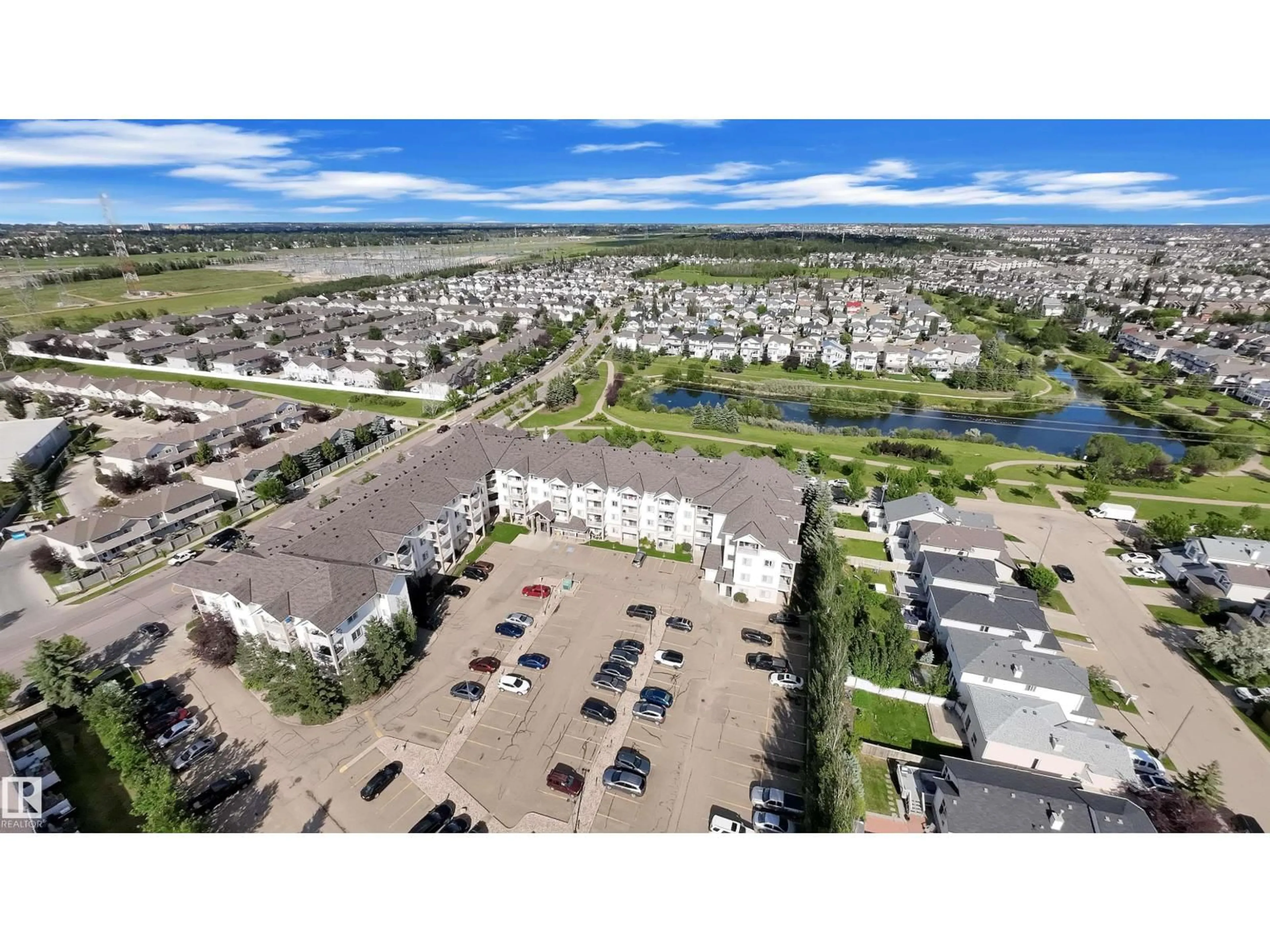 A pic from outside/outdoor area/front of a property/back of a property/a pic from drone, water/lake/river/ocean view for 245 - 122 EDWARDS DR, Edmonton Alberta T6X1J9