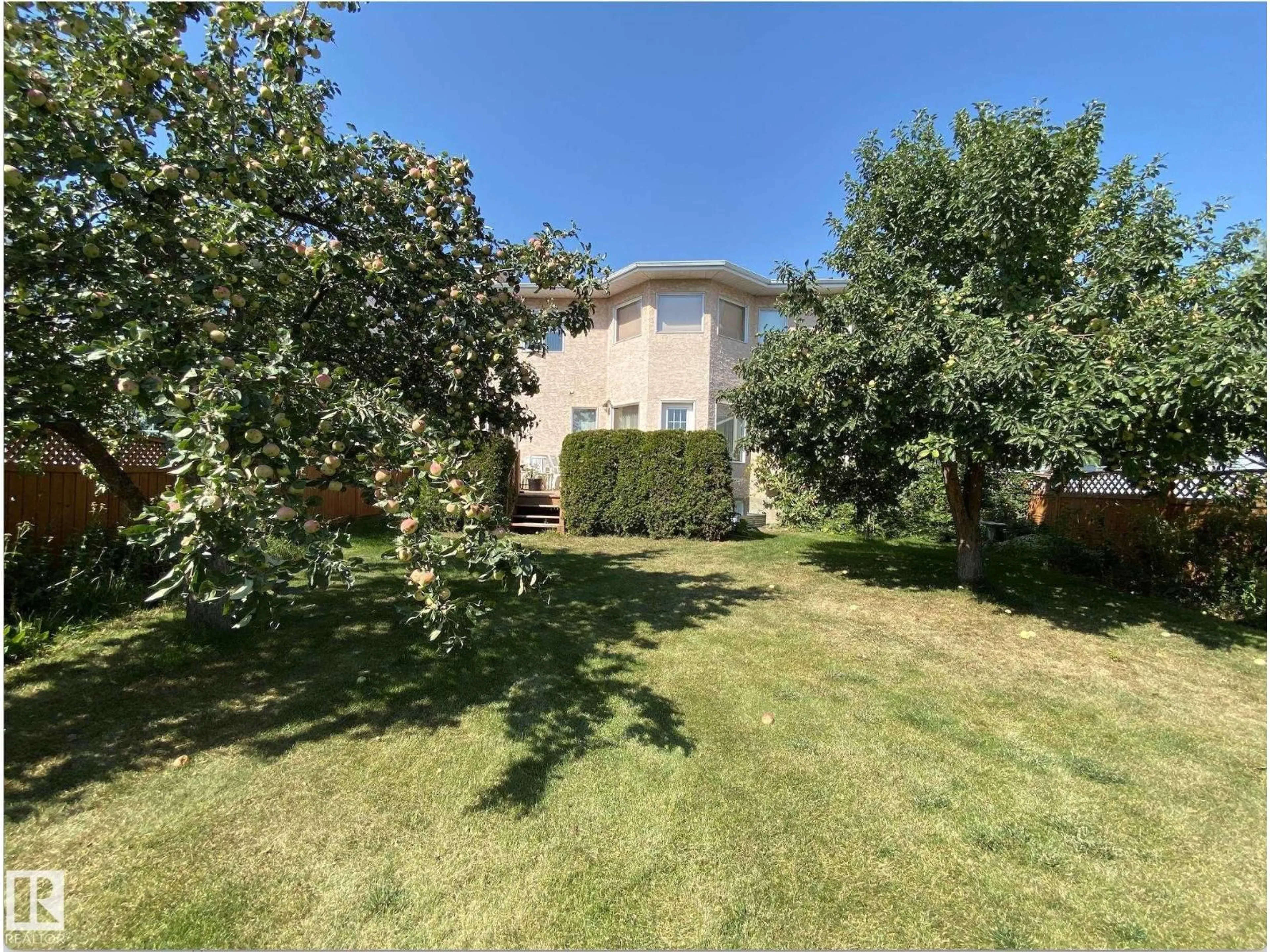 A pic from outside/outdoor area/front of a property/back of a property/a pic from drone, street for 6119 156 AV, Edmonton Alberta T5Y2N1