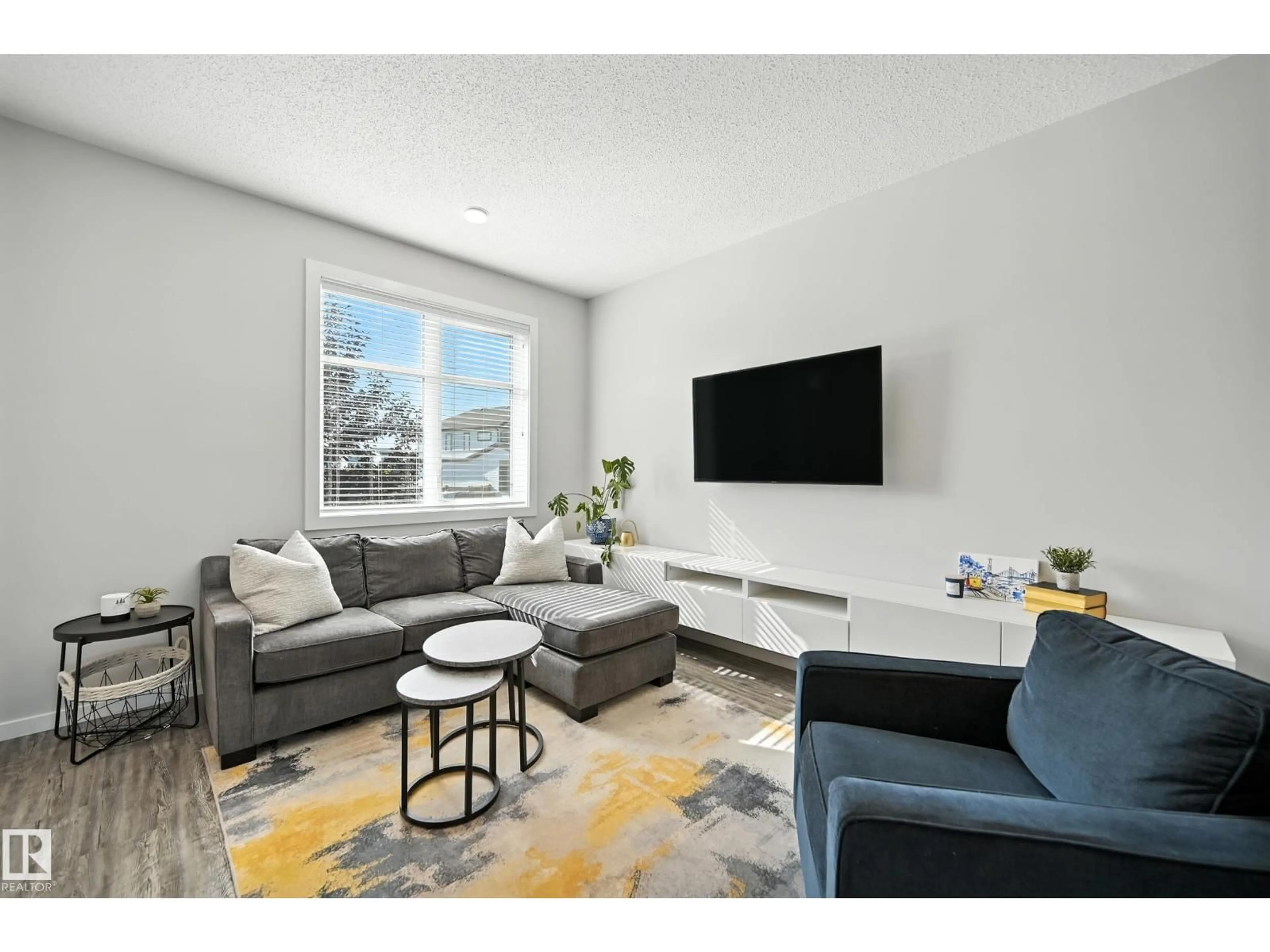 Living room with furniture, unknown for NW - 2625 202 ST, Edmonton Alberta T6M1K5