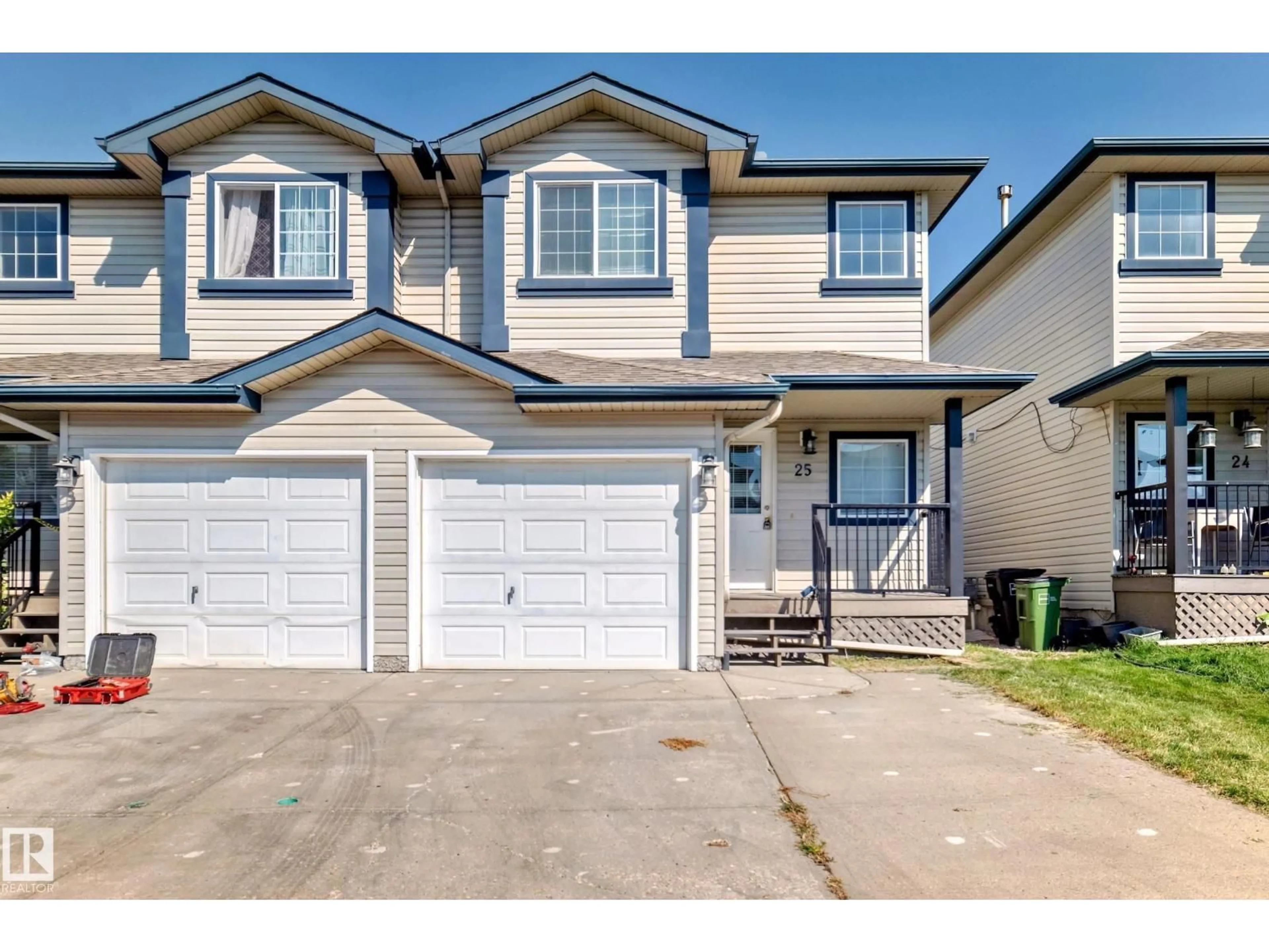 Home with vinyl exterior material, street for 25 - 345 KIRKNESS RD, Edmonton Alberta T5Y2M7