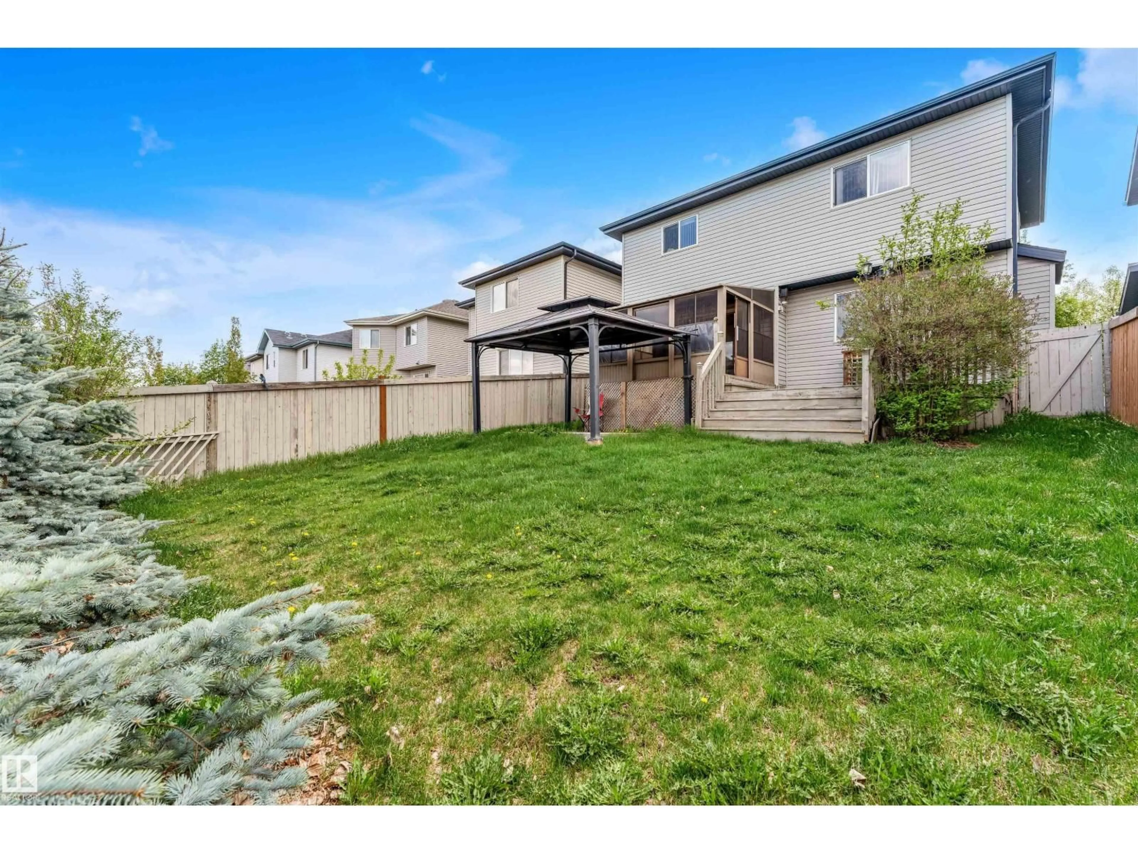 A pic from outside/outdoor area/front of a property/back of a property/a pic from drone, mountain view for SW - 144 55 ST, Edmonton Alberta T6X0L2