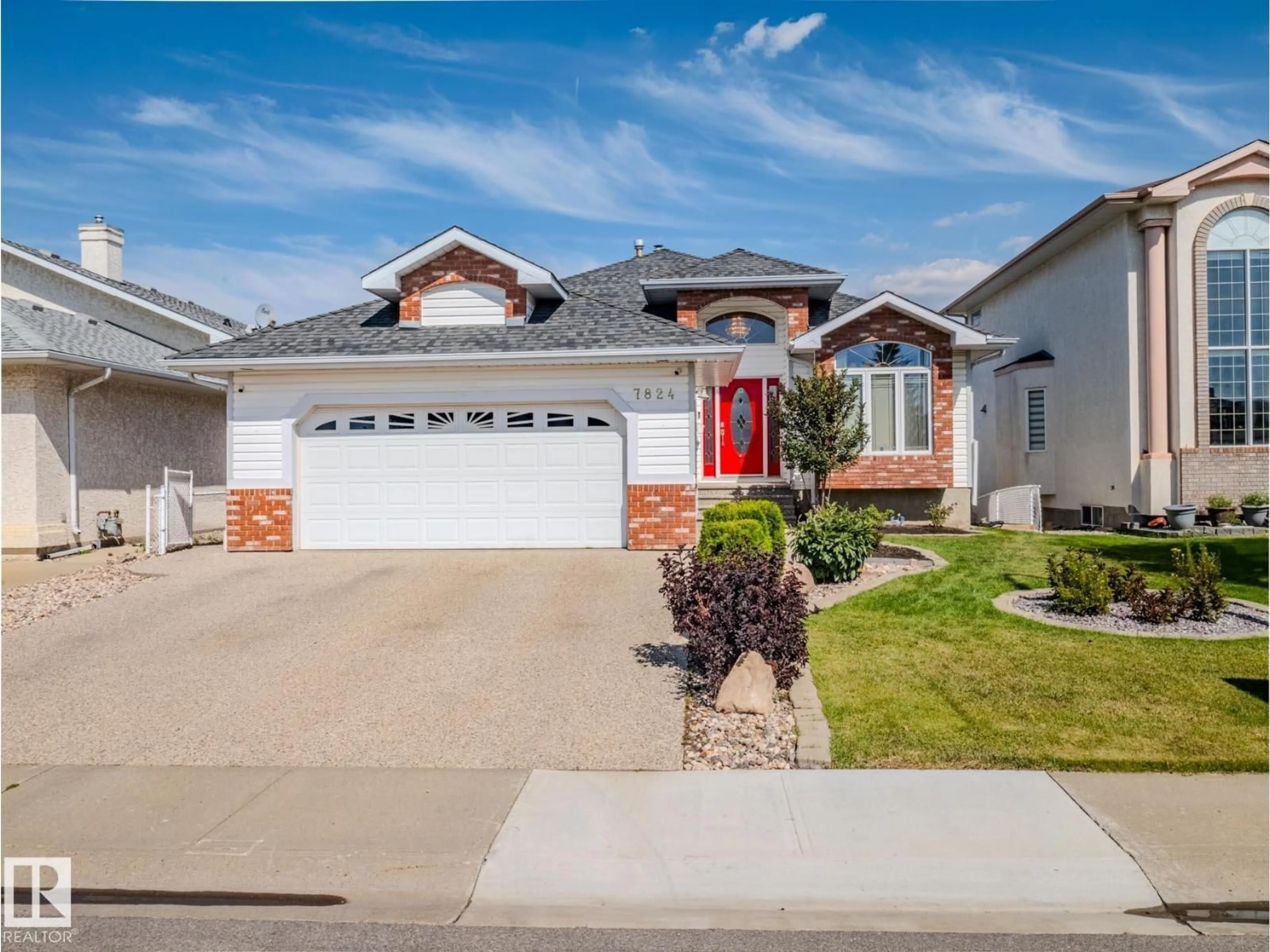 Home with vinyl exterior material, street for 7824 165 AV, Edmonton Alberta T5Z3J6