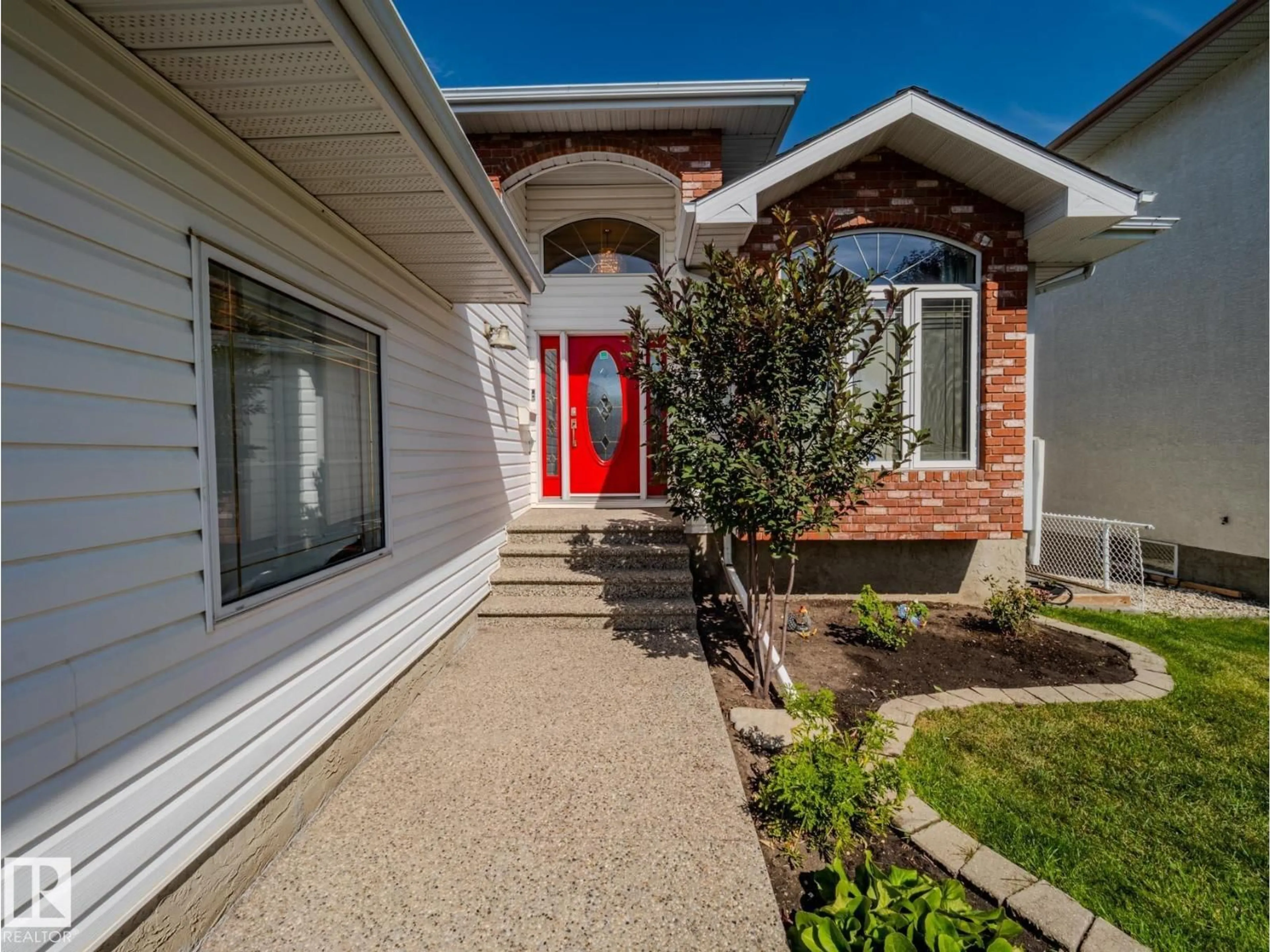 Home with brick exterior material, street for 7824 165 AV, Edmonton Alberta T5Z3J6