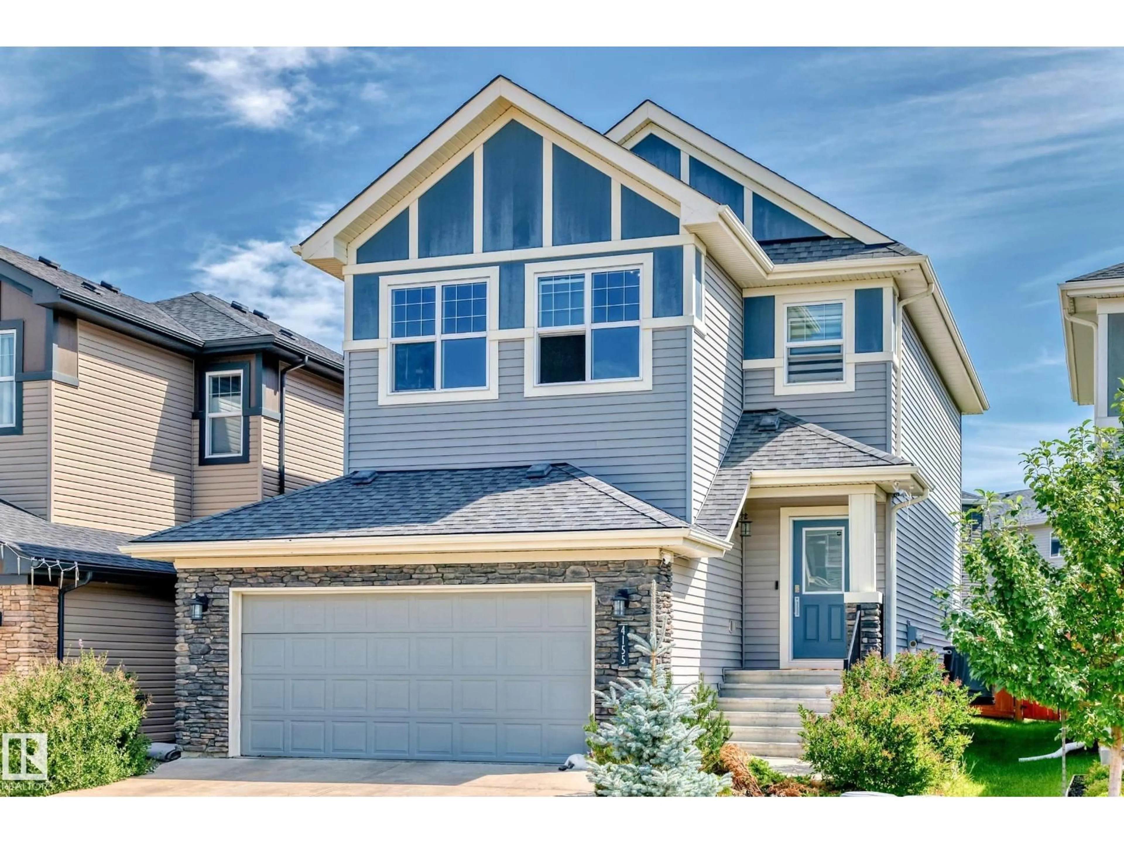 Home with vinyl exterior material, street for 4155 CHARLES LINK LI SW, Edmonton Alberta T6W3H1
