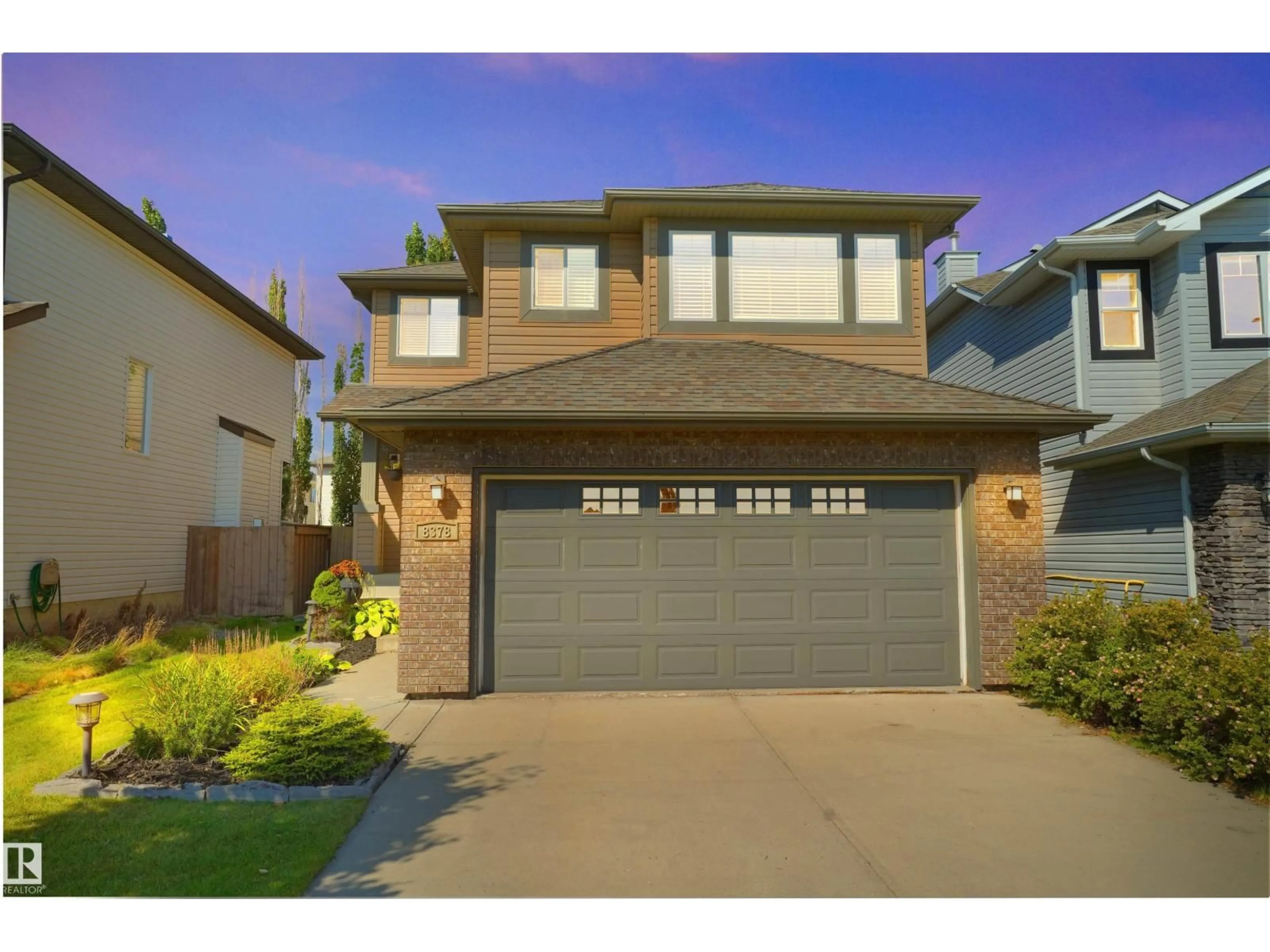 Home with vinyl exterior material, street for 8378 SHASKE CR, Edmonton Alberta T6R0B5