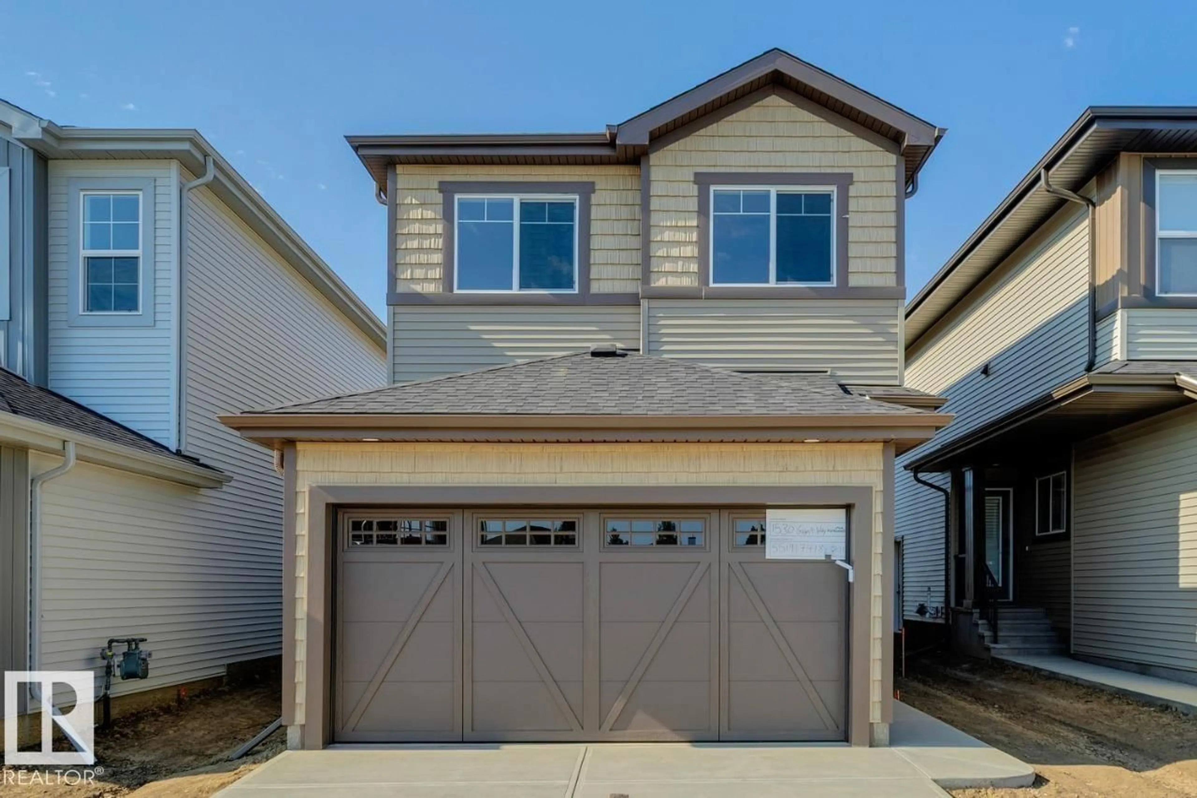 Home with vinyl exterior material, street for 1530 GRANT WY, Edmonton Alberta T5T0W2