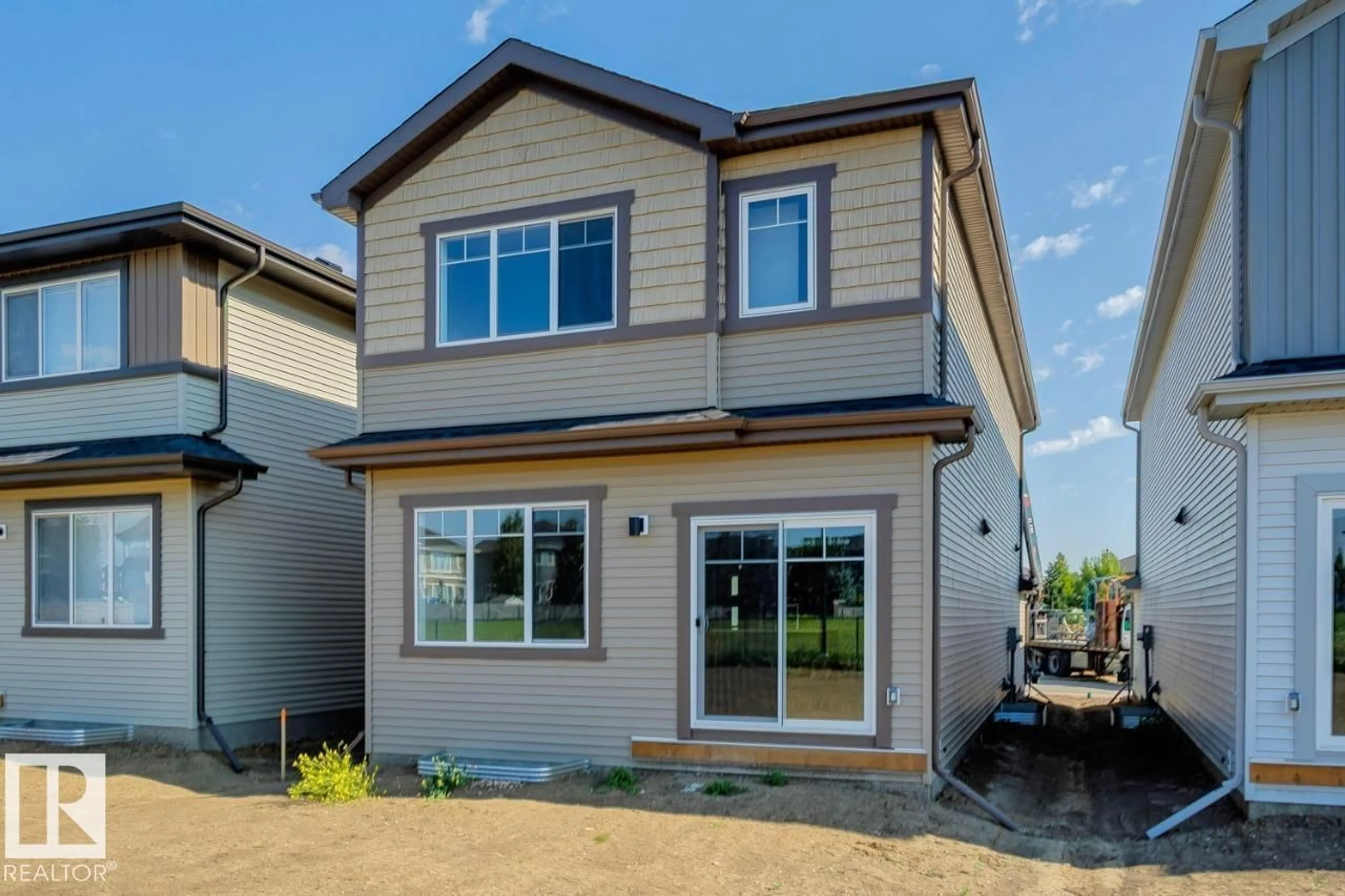 Home with vinyl exterior material, street for 1530 GRANT WY, Edmonton Alberta T5T0W2