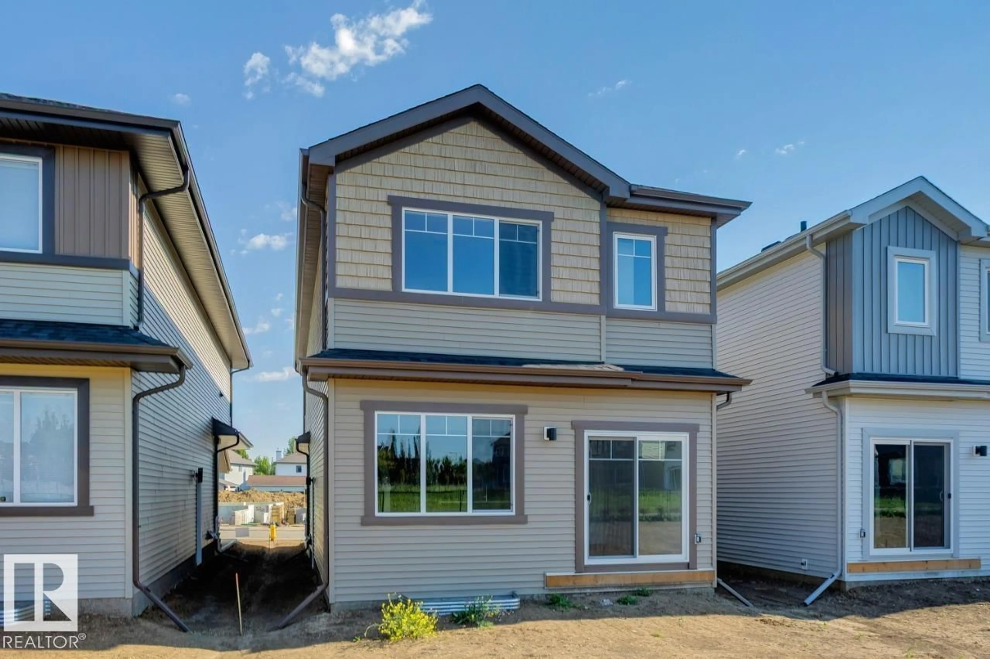 Home with vinyl exterior material, street for 1530 GRANT WY, Edmonton Alberta T5T0W2