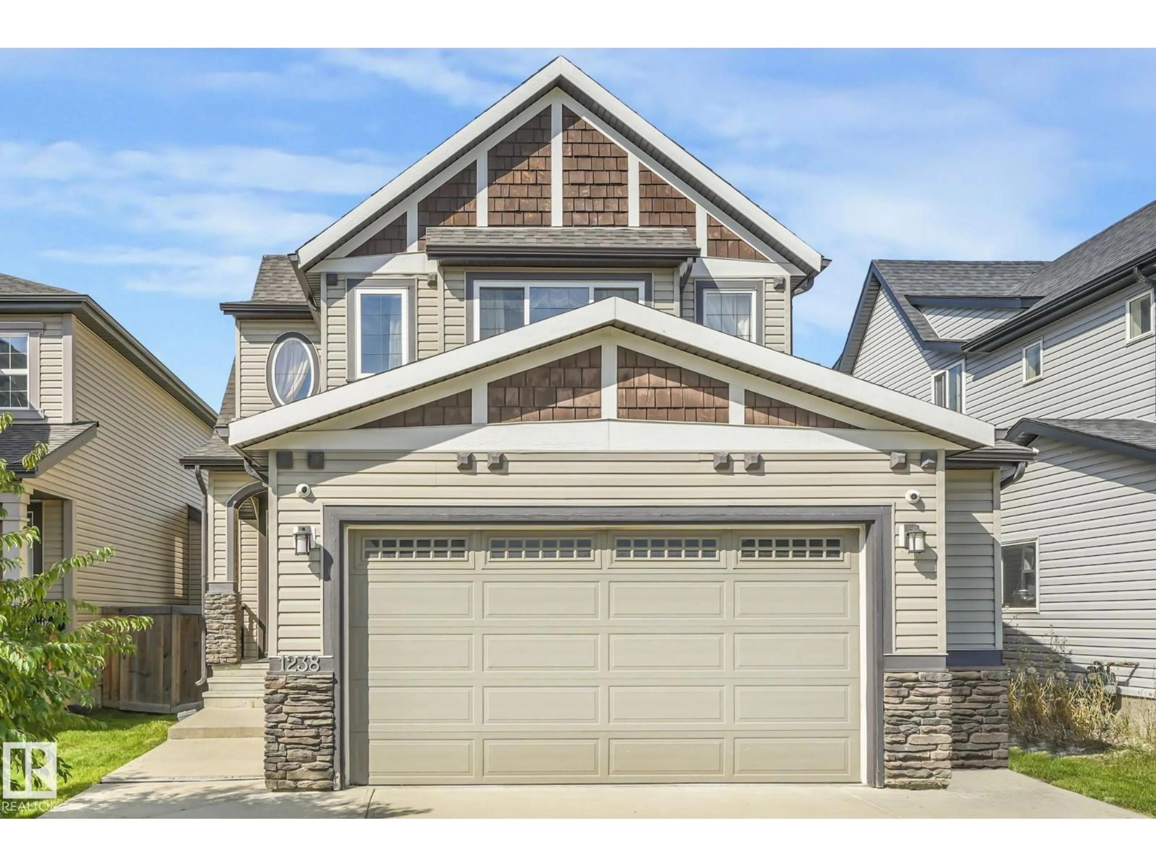 Home with vinyl exterior material, street for 1238 SECORD LANDING LD, Edmonton Alberta T5T4N3