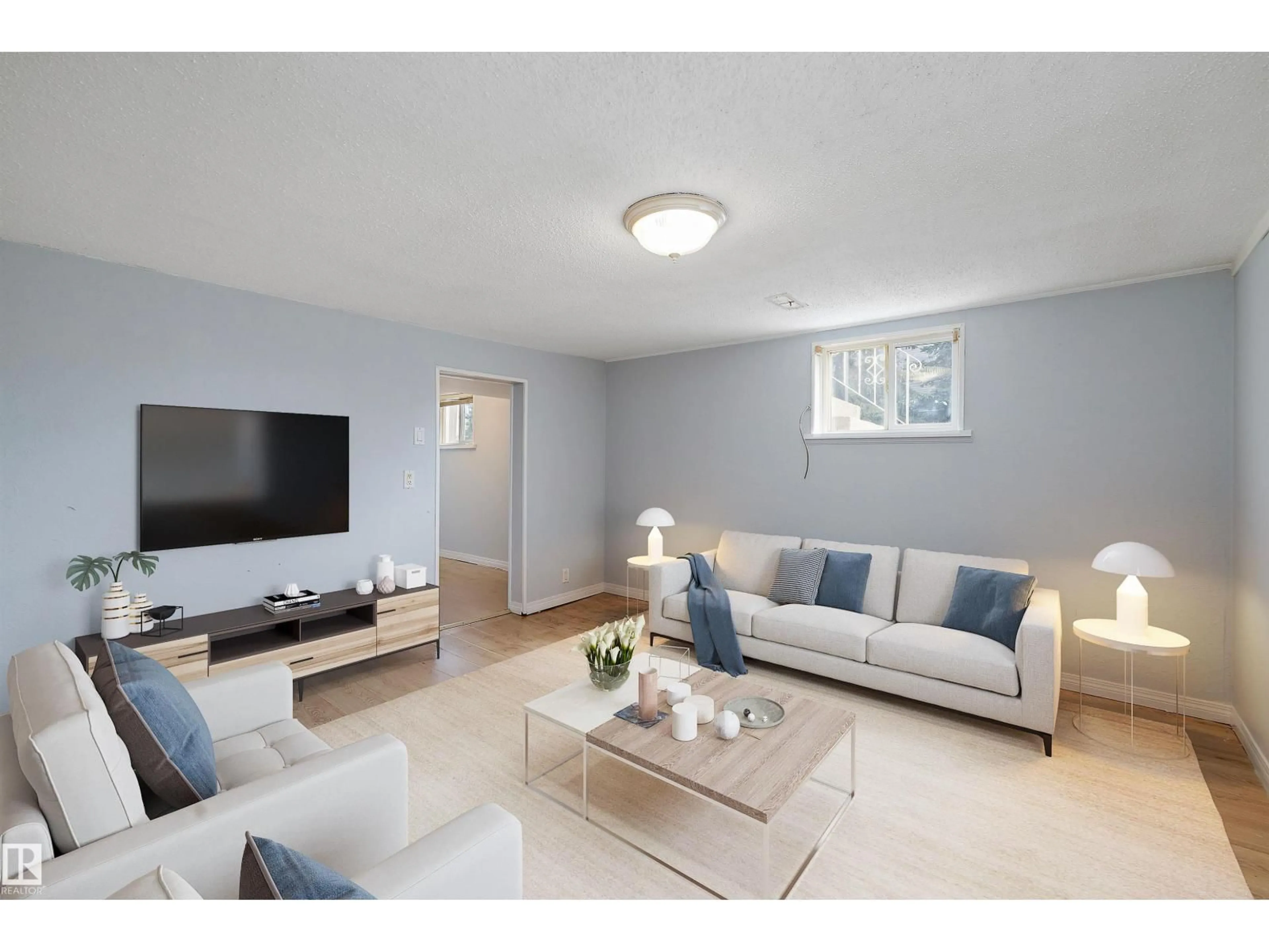 Living room with furniture, unknown for 8020 115 AV, Edmonton Alberta T5B0L1