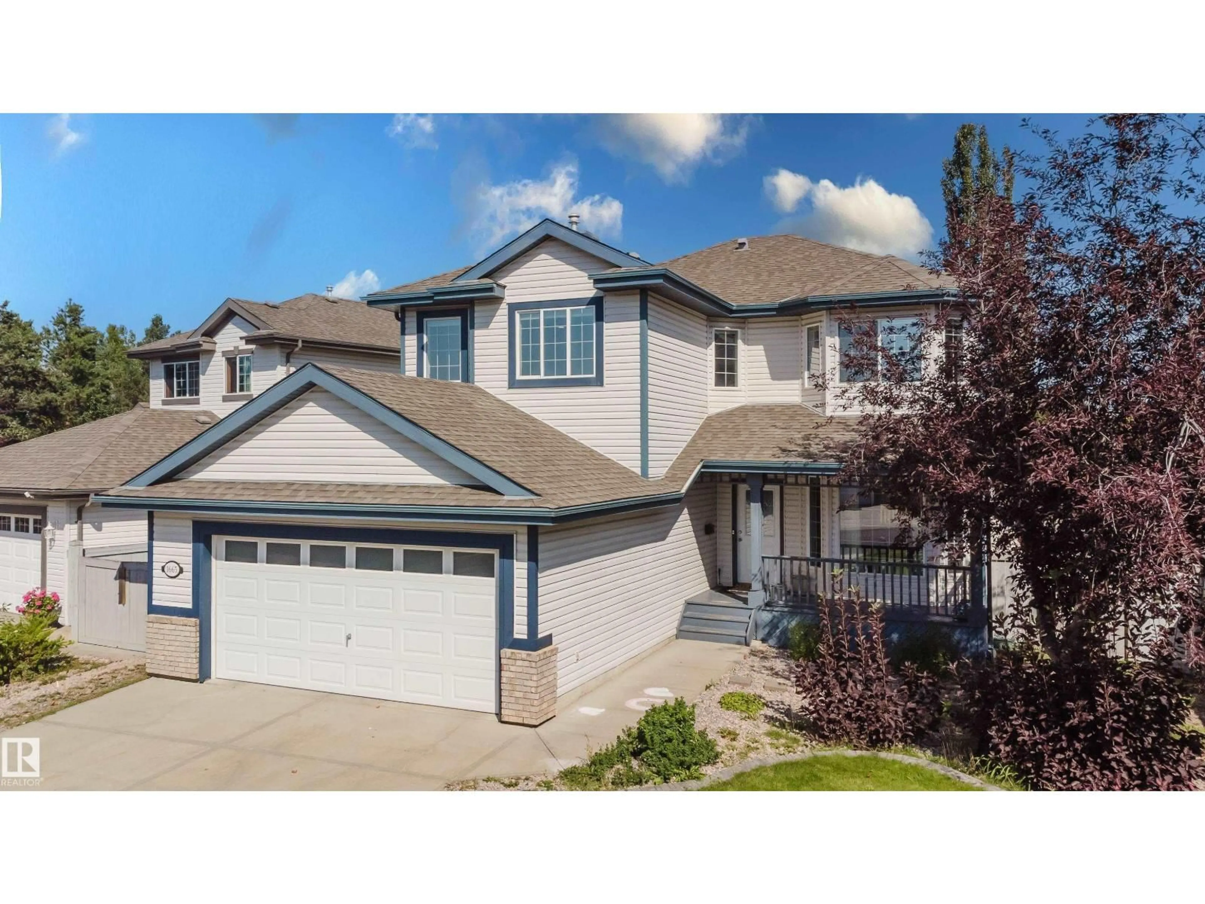 Home with vinyl exterior material, street for 1665 GLASTONBURY BV, Edmonton Alberta T5T6P3