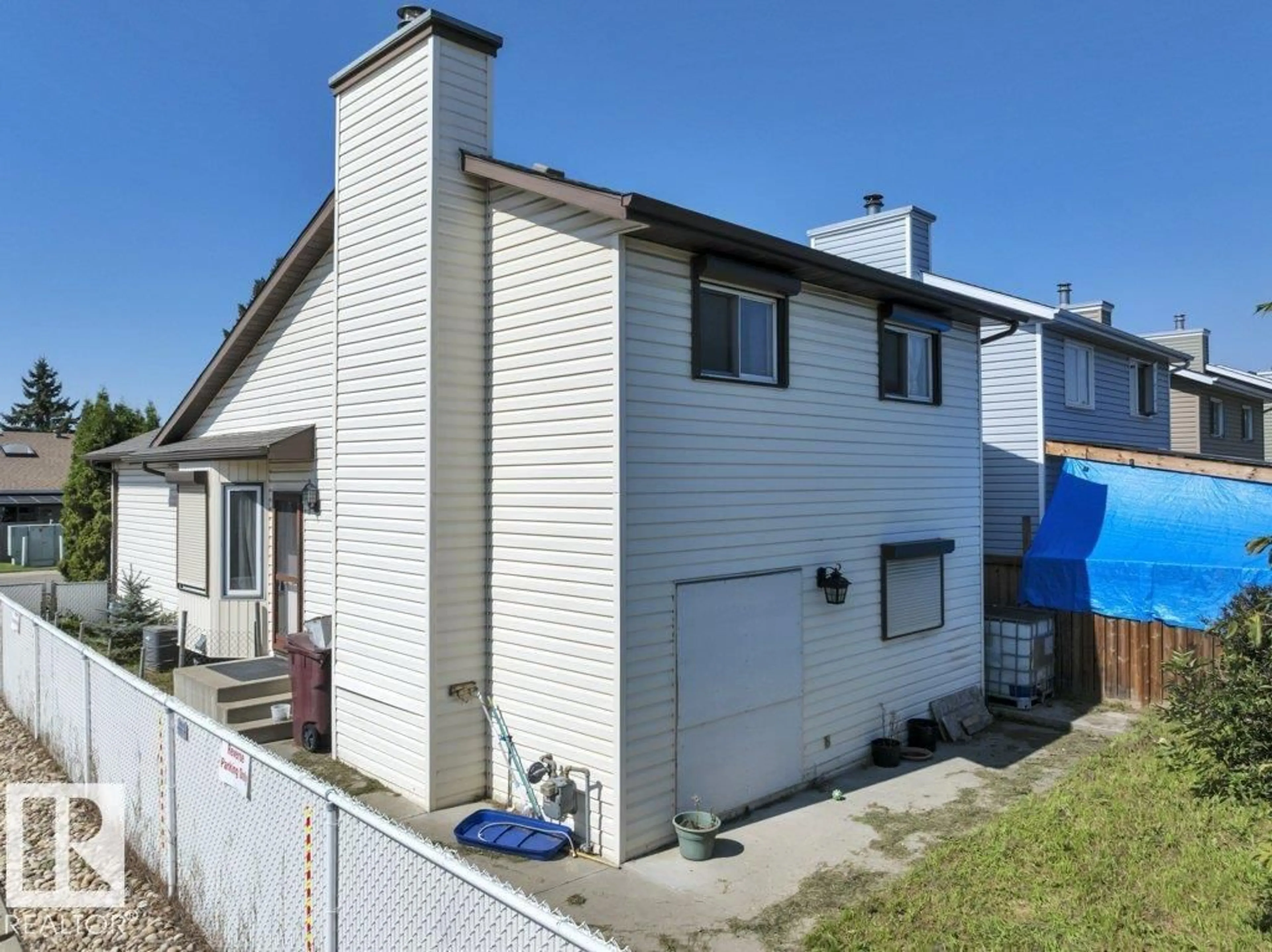 Home with vinyl exterior material, street for 2403 47 ST, Edmonton Alberta T6L4P6
