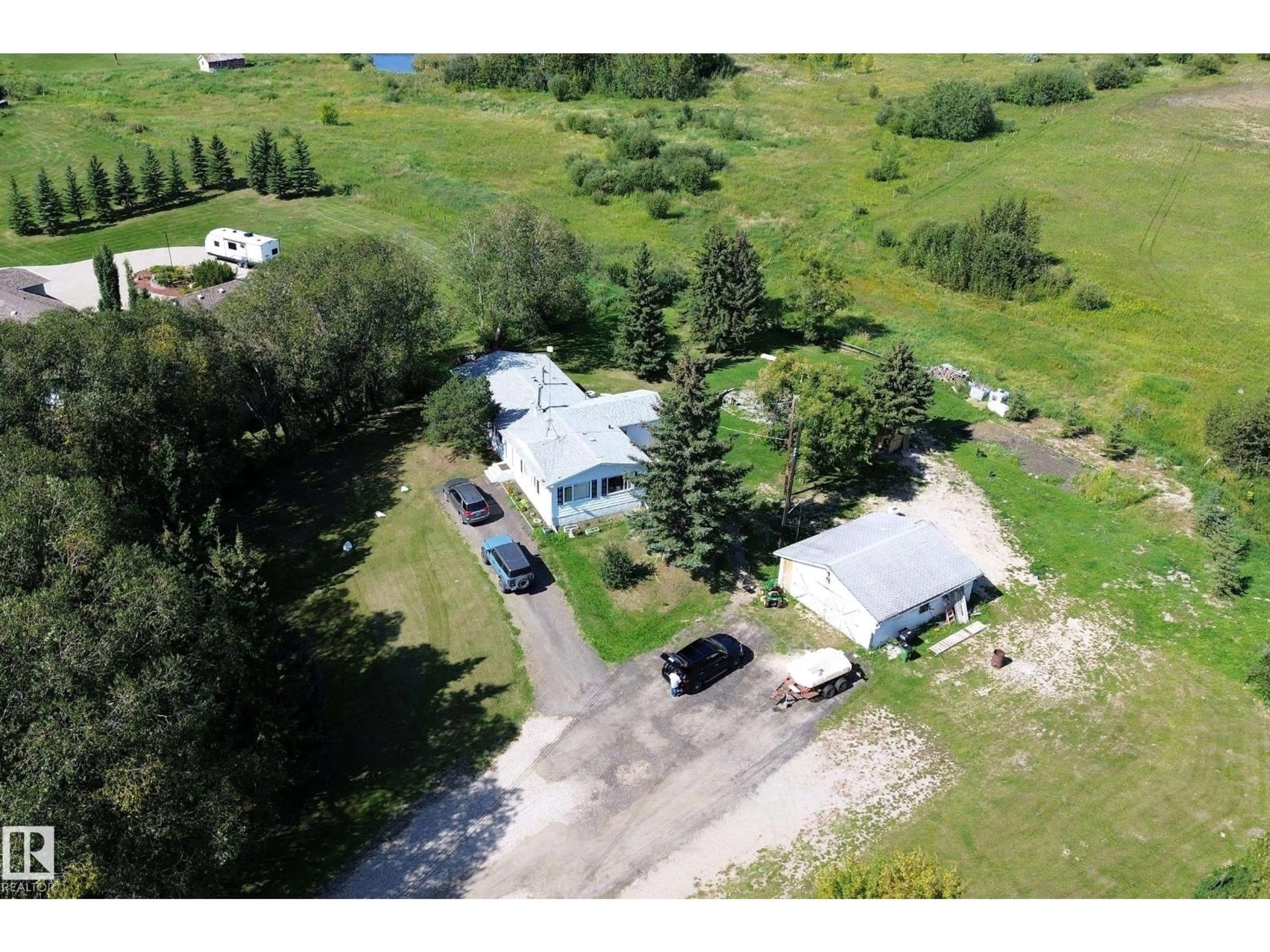 A pic from outside/outdoor area/front of a property/back of a property/a pic from drone, water/lake/river/ocean view for 3054 28 AV, Edmonton Alberta T6X1A5