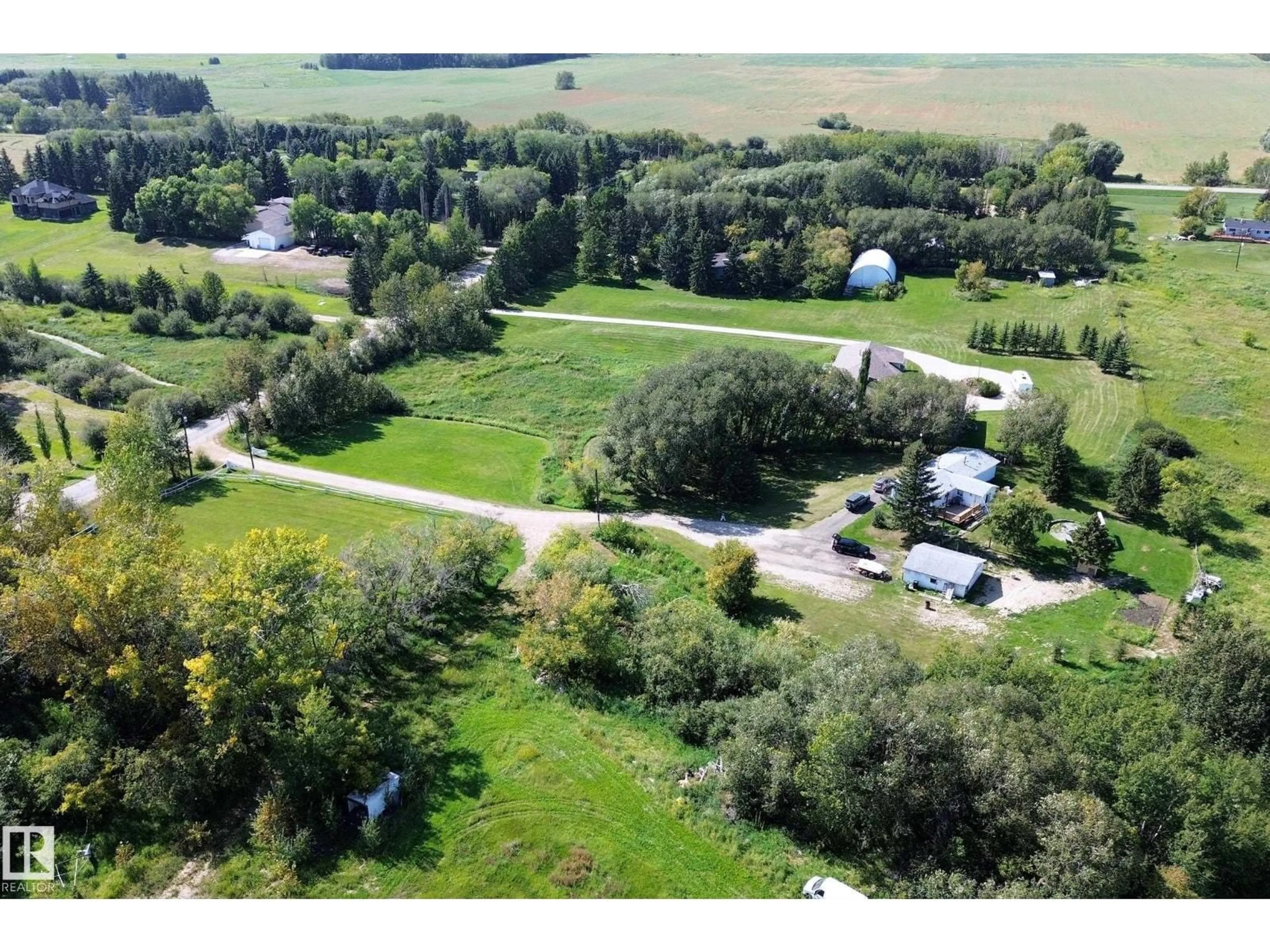 A pic from outside/outdoor area/front of a property/back of a property/a pic from drone, forest/trees view for 3054 28 AV, Edmonton Alberta T6X1A5